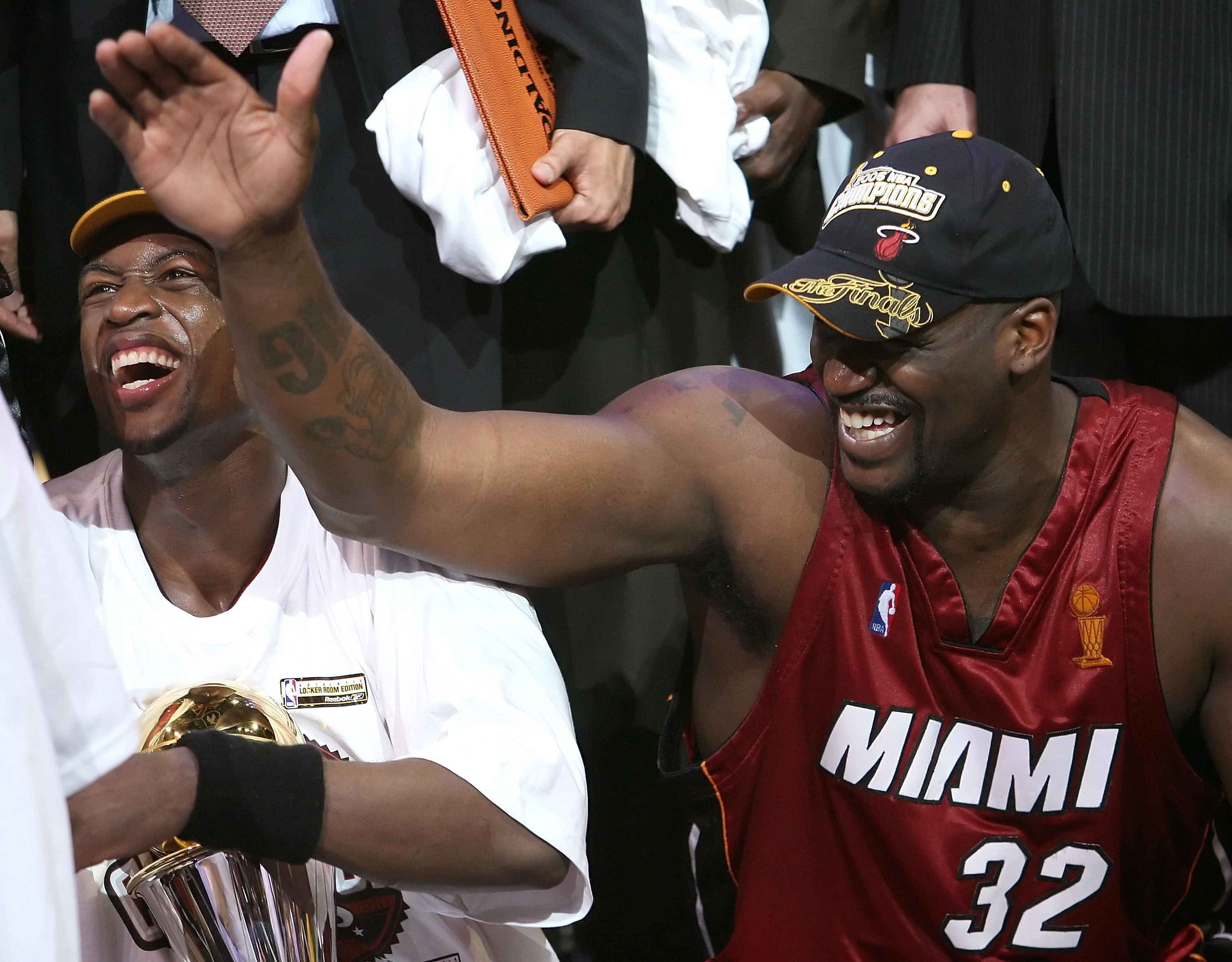 DALLAS - JUNE 20:  Series MVP Dwyane Wade #3 and Shaquille O'Neal #32 of the Miami Heat celebrate together after the Heat defeated the Dallas Mavericks in game six of the 2006 NBA Finals on June 20, 2006 at American Airlines Center in Dallas, Texas.  The