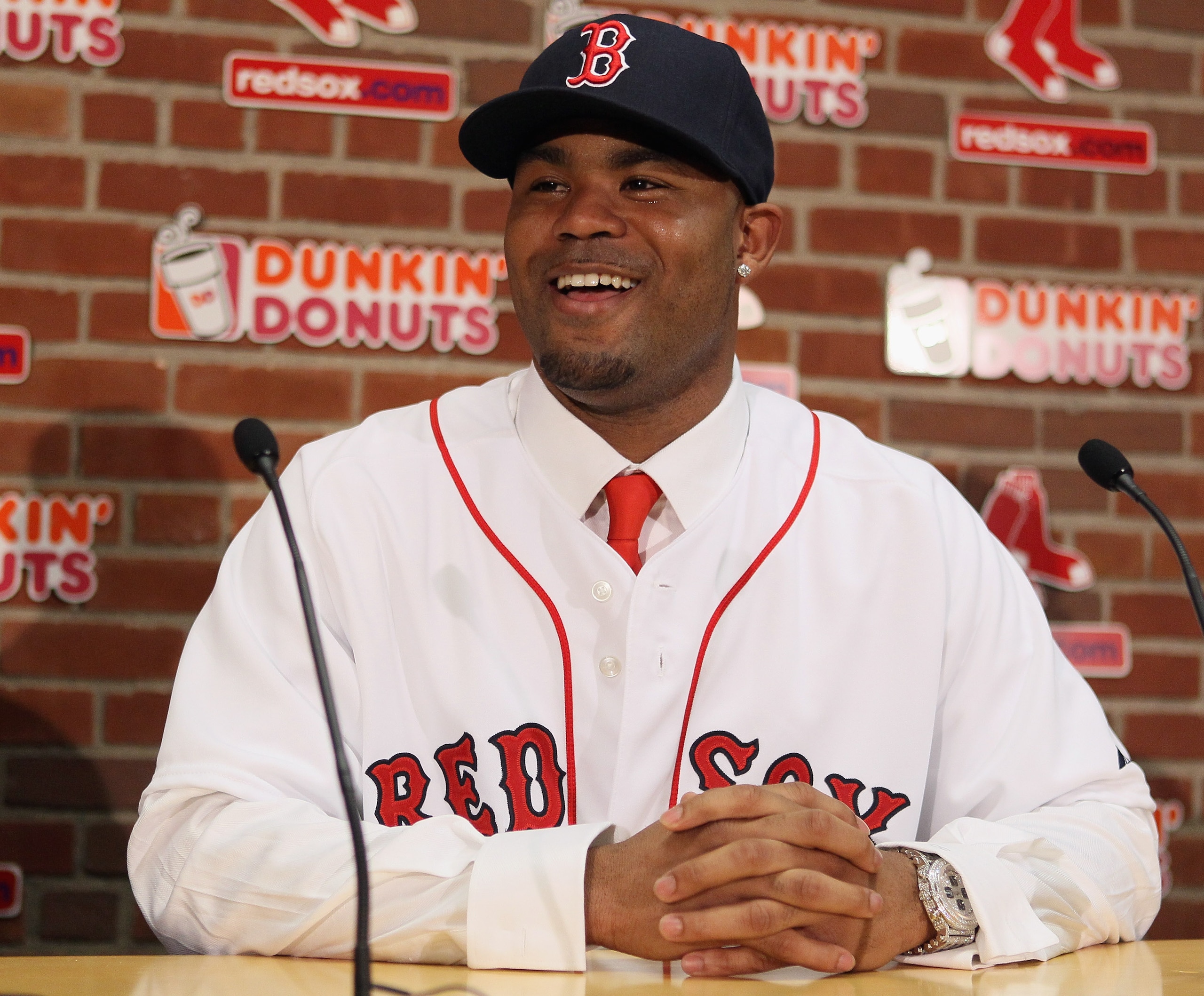 BOSTON, MA - DECEMBER 11:  Carl Crawford answers questions during a press conference announcing his signing with the Boston Red Sox on December 11,  2010 at the Fenway Park in Boston, Massachusetts.  (Photo by Elsa/Getty Images)
