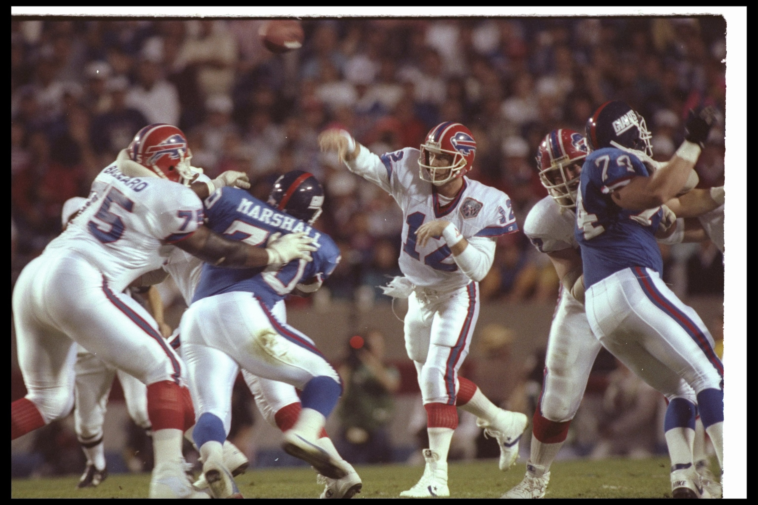 12 Jan 1991: Quarterback Jim Kelly #12 of the Buffalo Bills throws the ball against the New York Giants during Super Bowl XXV at Tampa Stadium in Tampa, Florida. The Giants won the game, 20-19.