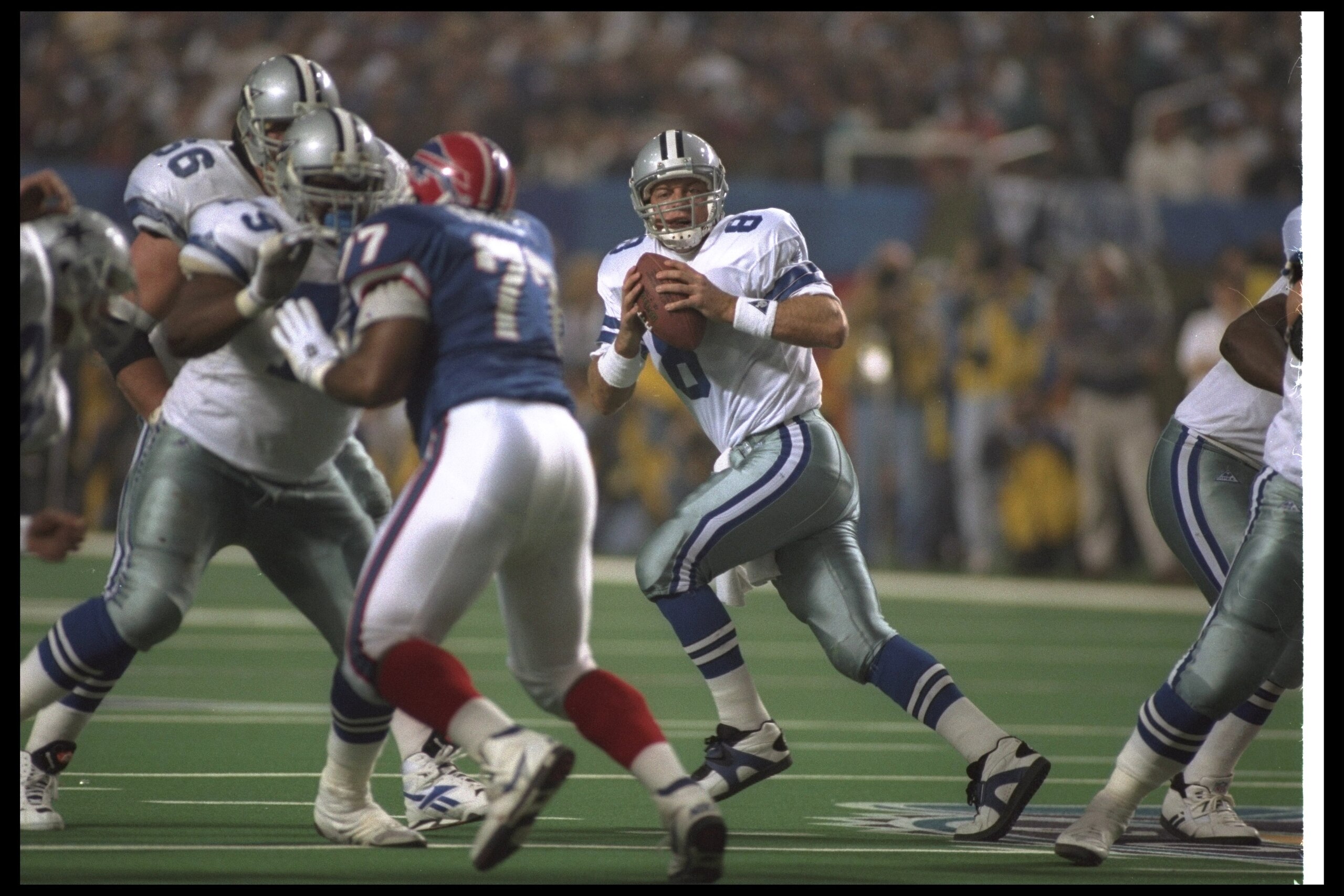 30 Jan 1994:  Quarterback Troy Aikman of the Dallas Cowboys drops back to pass during the fourth quarter of Super Bowl XXVIII against the Buffalo Bills at the Georgia Dome in Atlanta, Georgia.  The Cowboys won the game, 30-13. Mandatory Credit: Rick Stewa
