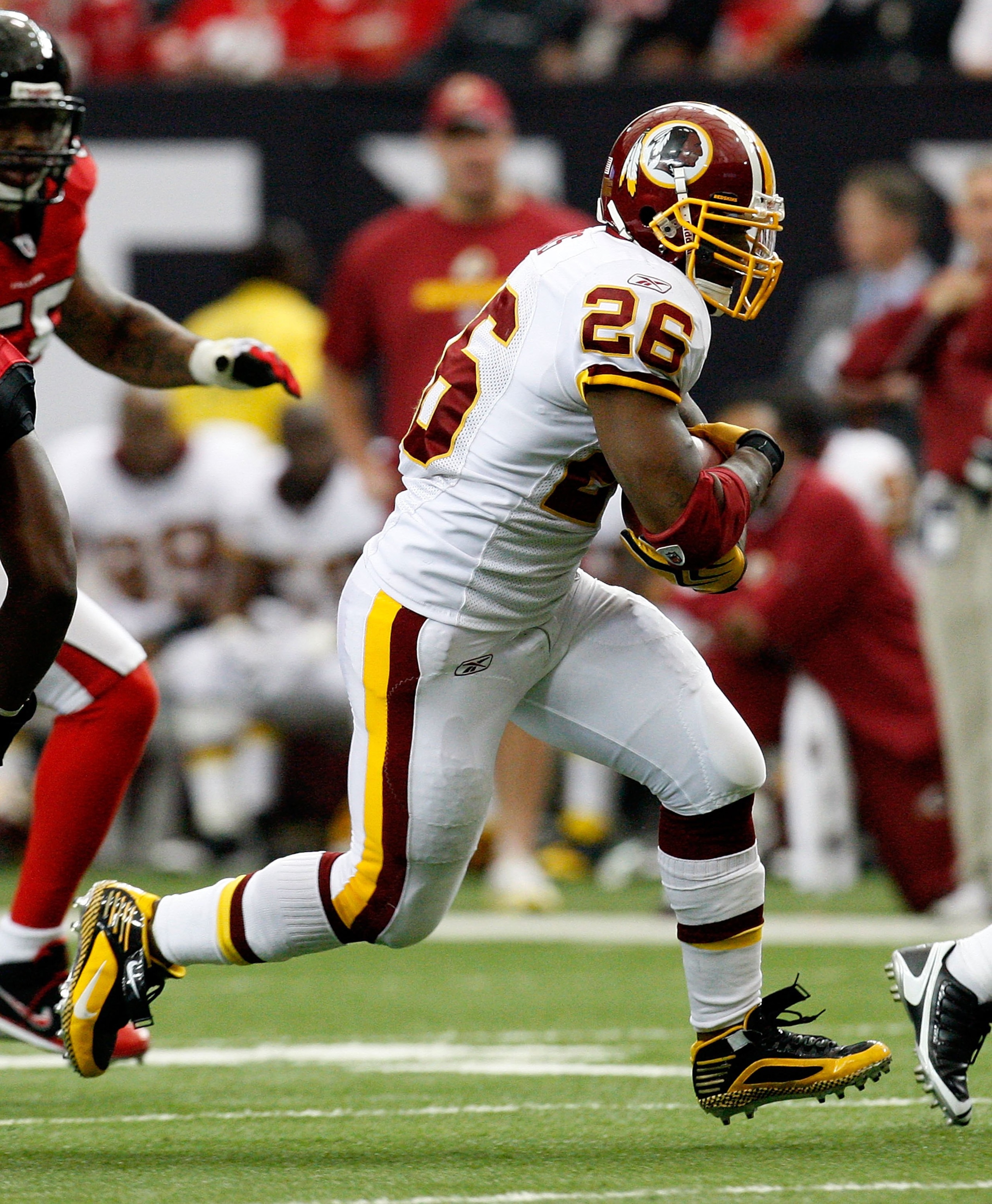 ATLANTA - NOVEMBER 08:  Clinton Portis #26 of the Washington Redskins against of the Atlanta Falcons at Georgia Dome on November 8, 2009 in Atlanta, Georgia.  (Photo by Kevin C. Cox/Getty Images)