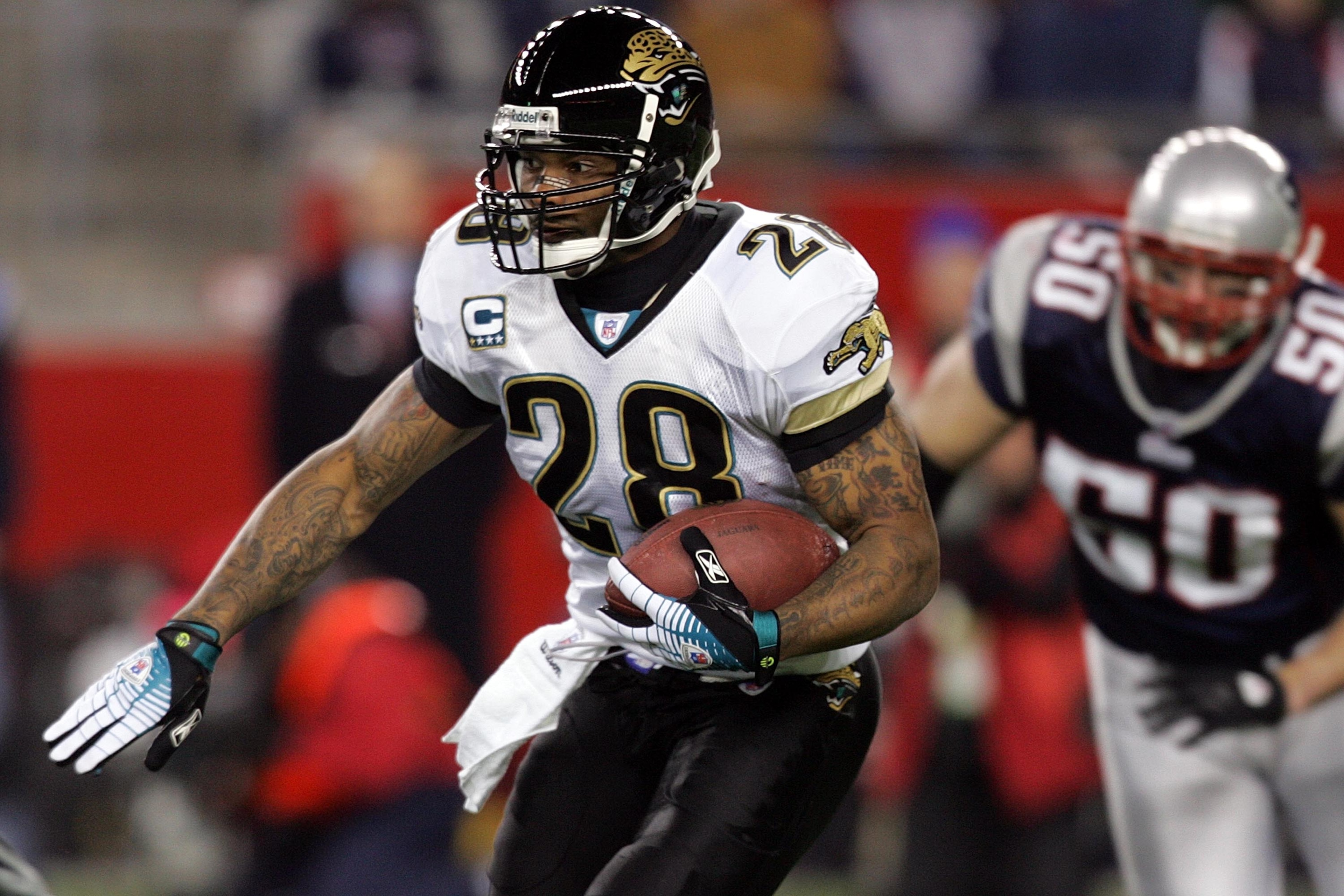 FOXBOROUGH, MA - JANUARY 12: Fred Taylor #28 of the Jacksonville Jaguars runs the ball against the New England Patriots during the AFC Divisional playoff game at Gillette Stadium game on January 12, 2008 in Foxboro, Massachusetts. (Photo by Jim McIsaac/G FOXBOROUGH, MA - JANUARY 12: Fred Taylor #28 of the Jacksonville Jaguars runs the ball against the New England Patriots during the AFC Divisional playoff game at Gillette Stadium game on January 12, 2008 in Foxboro, Massachusetts. (Photo by Jim McIsaac/G