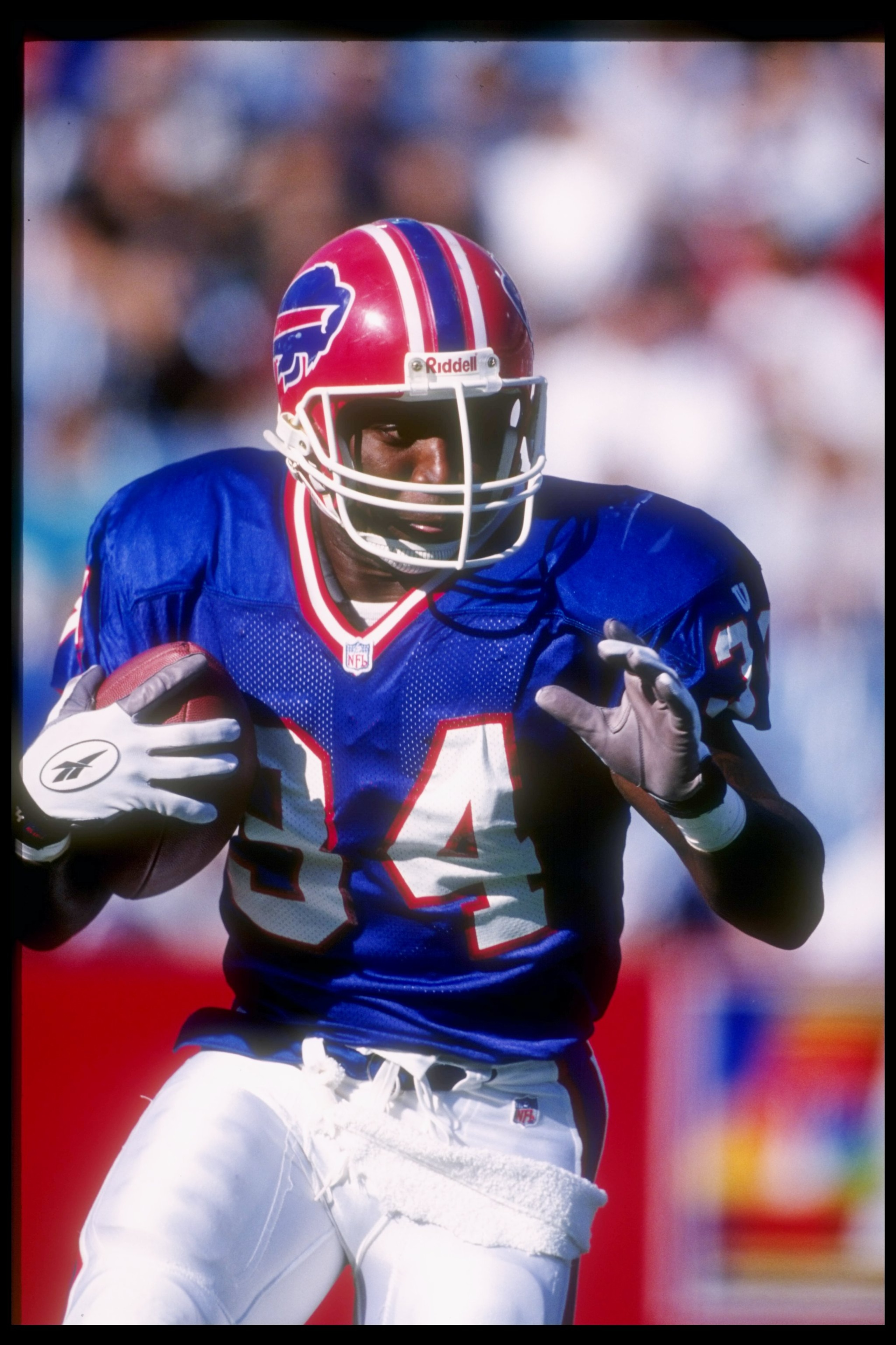 21 Sep 1997:  Running back Thurman Thomas #34 of the Buffalo Bills carries the football during the Bills 37-35 win over the Indianapolis Colts at Rich Stadium in Orchard Park, New York. Mandatory Credit: Rick Stewart  /Allsport