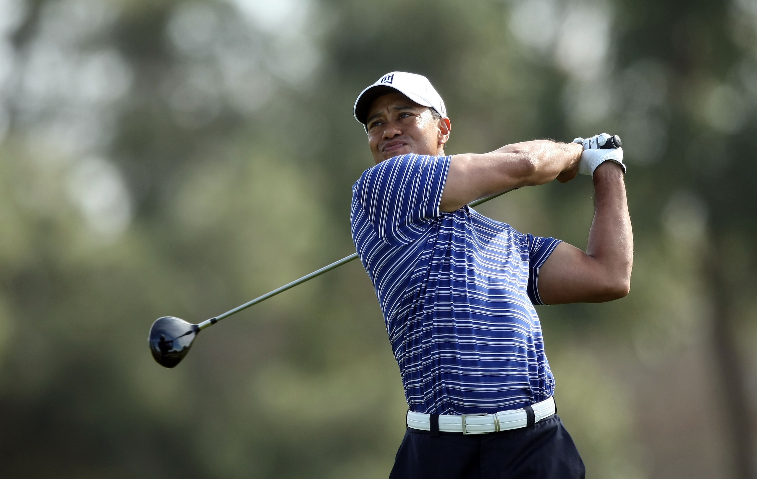 LA JOLLA, CA - JANUARY 26: Tiger Woods tees off during the Pro-Am at the Farmers Insurance Open at Torrey Pines on January 26, 2011 in La Jolla, California. (Photo by Donald Miralle/Getty Images) LA JOLLA, CA - JANUARY 26: Tiger Woods tees off during the Pro-Am at the Farmers Insurance Open at Torrey Pines on January 26, 2011 in La Jolla, California. (Photo by Donald Miralle/Getty Images)