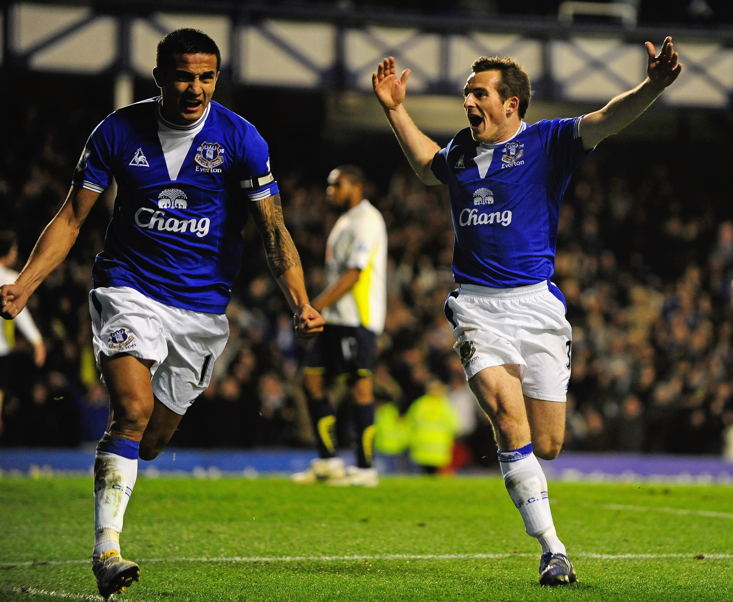 LIVERPOOL, ENGLAND - DECEMBER 06: Tim Cahill of Everton celebrates scoring his team's second goal with team mate Leighton Baines (R) during the Barclays Premier League match between Everton and Tottenham Hotspur at Goodison Park on December 6, 2009 in Li LIVERPOOL, ENGLAND - DECEMBER 06: Tim Cahill of Everton celebrates scoring his team's second goal with team mate Leighton Baines (R) during the Barclays Premier League match between Everton and Tottenham Hotspur at Goodison Park on December 6, 2009 in Li