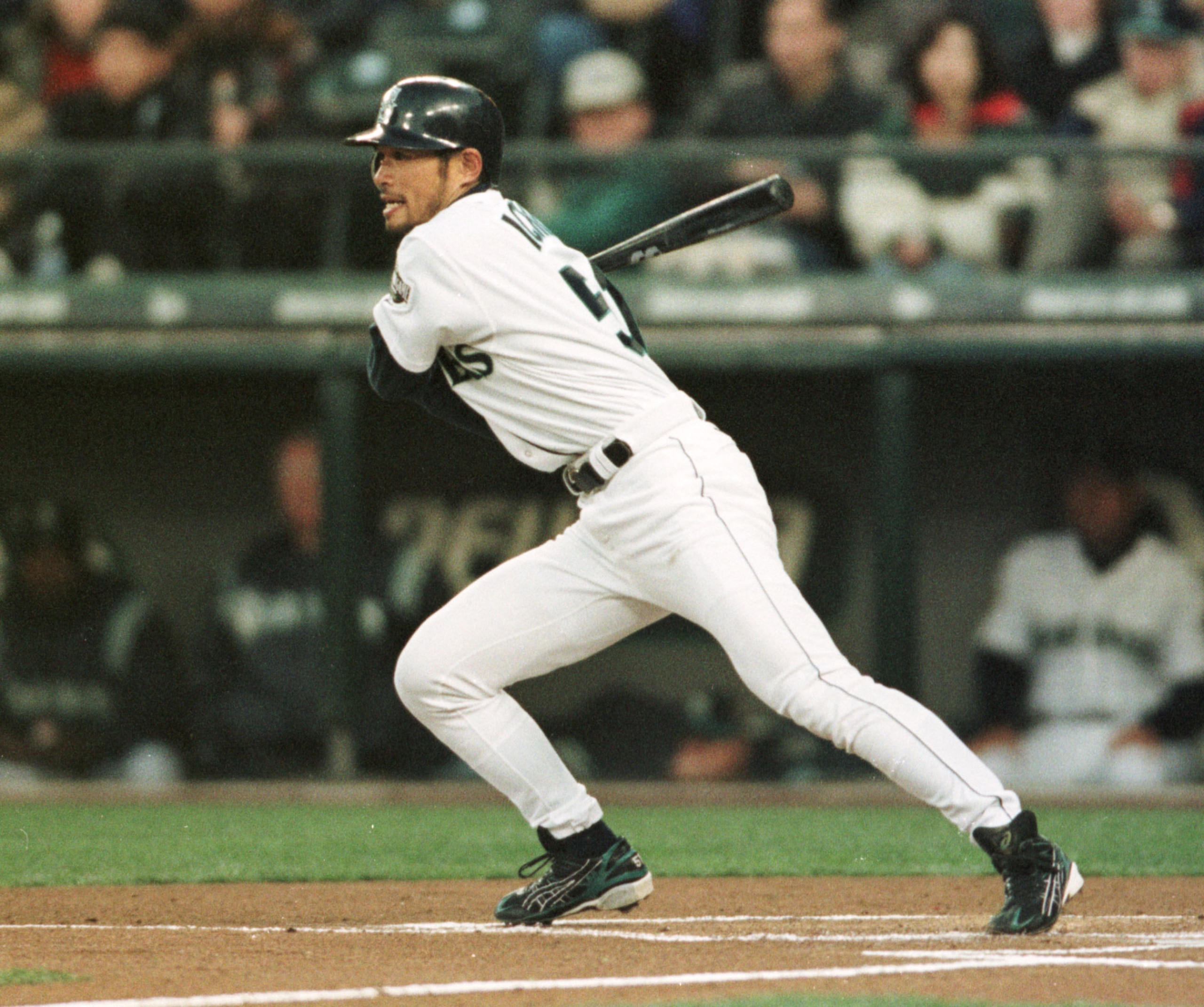 2 APR 2001:  Ichiro Suzuki of the Seattle Mariners grounds out in his first at bat as a Mariner against the Oakland A's on opening night at Safeco Field in Seattle Washington. Mandatory Credit: Otto Greule/ALLSPORT