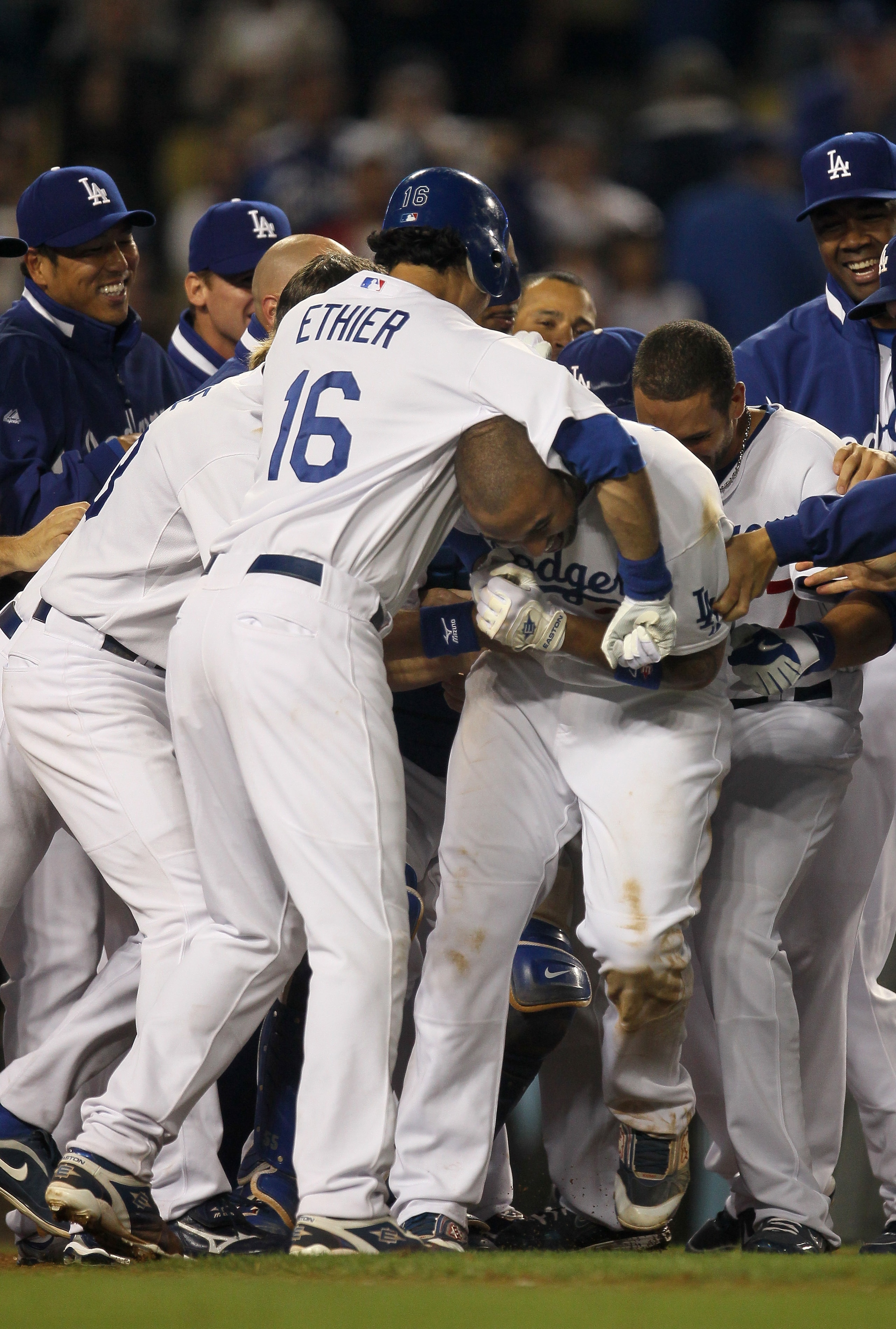 LOS ANGELES, CA - JUNE 01:  Andre Ethier #16 of the Los Angeles Dodgers puts Matt Kemp #27 in a headlock as the Dodgers celebrate at home plate after Kemp's walk off home run in the tenth inning against the Arizona Diamondbacks on June 1, 2010 at Dodger S