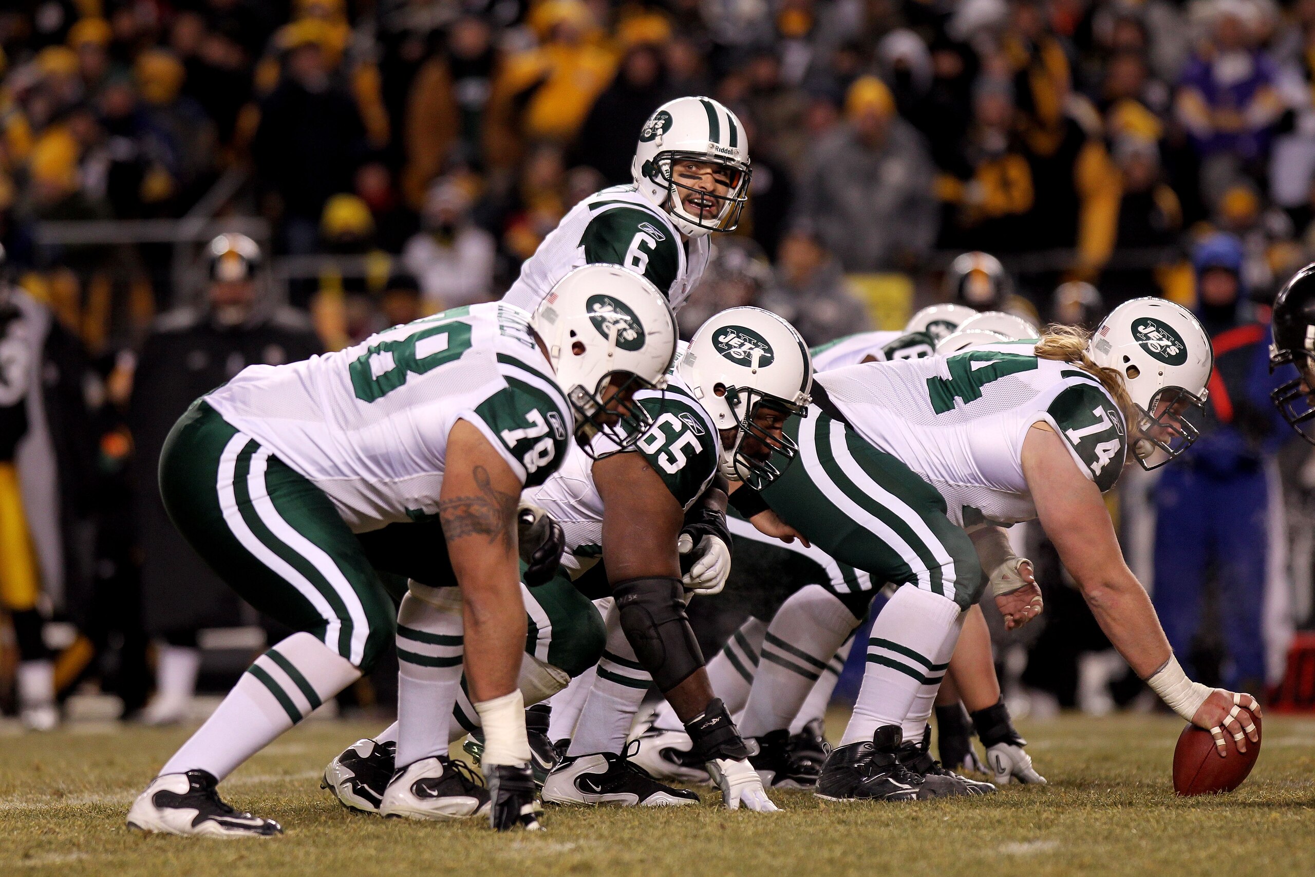 PITTSBURGH, PA - JANUARY 23: Quarterback Mark Sanchez #6 of the New York Jets calls signals at the line of scgimmage behind Wayne Hunter #78, Brandon Moore #65 and center Nick Mangold #74 against the Pittsburgh Steelers during the 2011 AFC Championship g PITTSBURGH, PA - JANUARY 23: Quarterback Mark Sanchez #6 of the New York Jets calls signals at the line of scgimmage behind Wayne Hunter #78, Brandon Moore #65 and center Nick Mangold #74 against the Pittsburgh Steelers during the 2011 AFC Championship g
