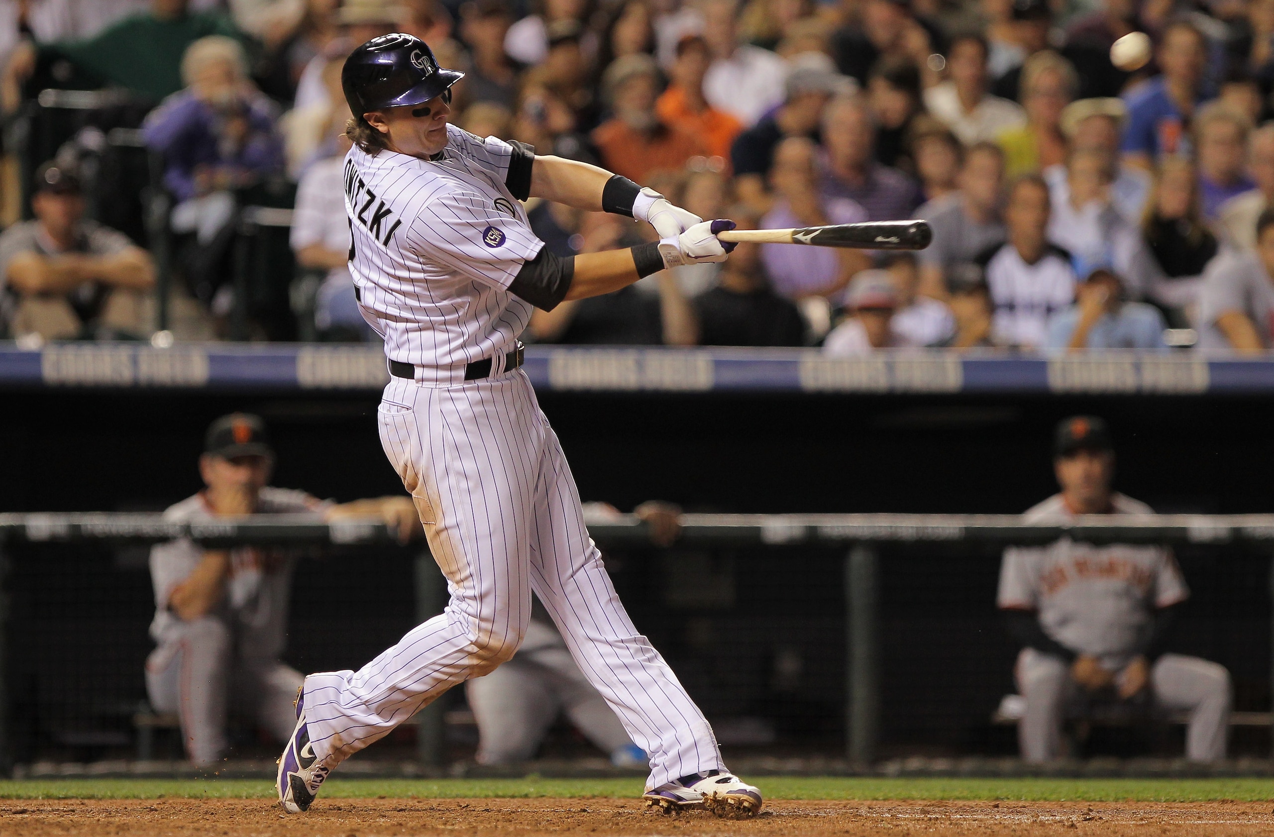 DENVER - SEPTEMBER 25: Troy Tulowitzki #2 of the Colorado Rockies hits a two run homerun to give the Rockies a 5-4 lead over the San Francisco Giants in the fifth inning at Coors Field on September 25, 2010 in Denver, Colorado. (Photo by Doug Pensinger/ DENVER - SEPTEMBER 25: Troy Tulowitzki #2 of the Colorado Rockies hits a two run homerun to give the Rockies a 5-4 lead over the San Francisco Giants in the fifth inning at Coors Field on September 25, 2010 in Denver, Colorado. (Photo by Doug Pensinger/