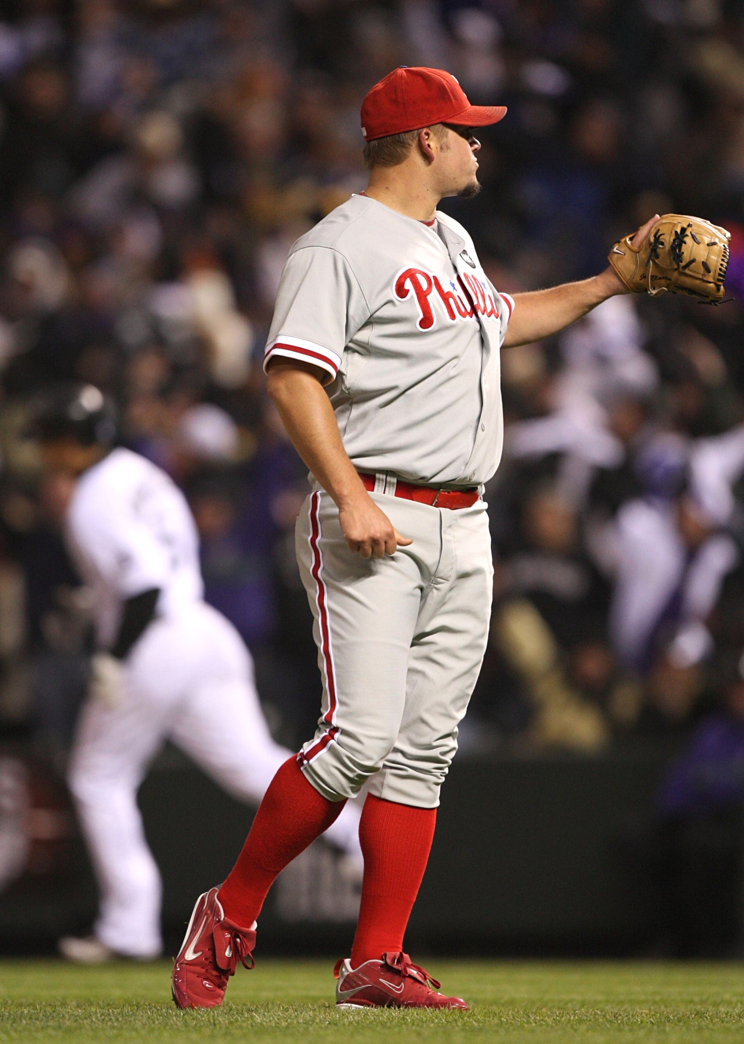 DENVER - OCTOBER 11:  Joe Blanton #56  (R) of the Philadelphia Phillies reacts after giving up a game tying home run to Carlos Gonzalez #5 (L) of the Colorado Rockies in the bottom of the fourth inning in Game Three of the NLDS during the 2009 MLB Playoff