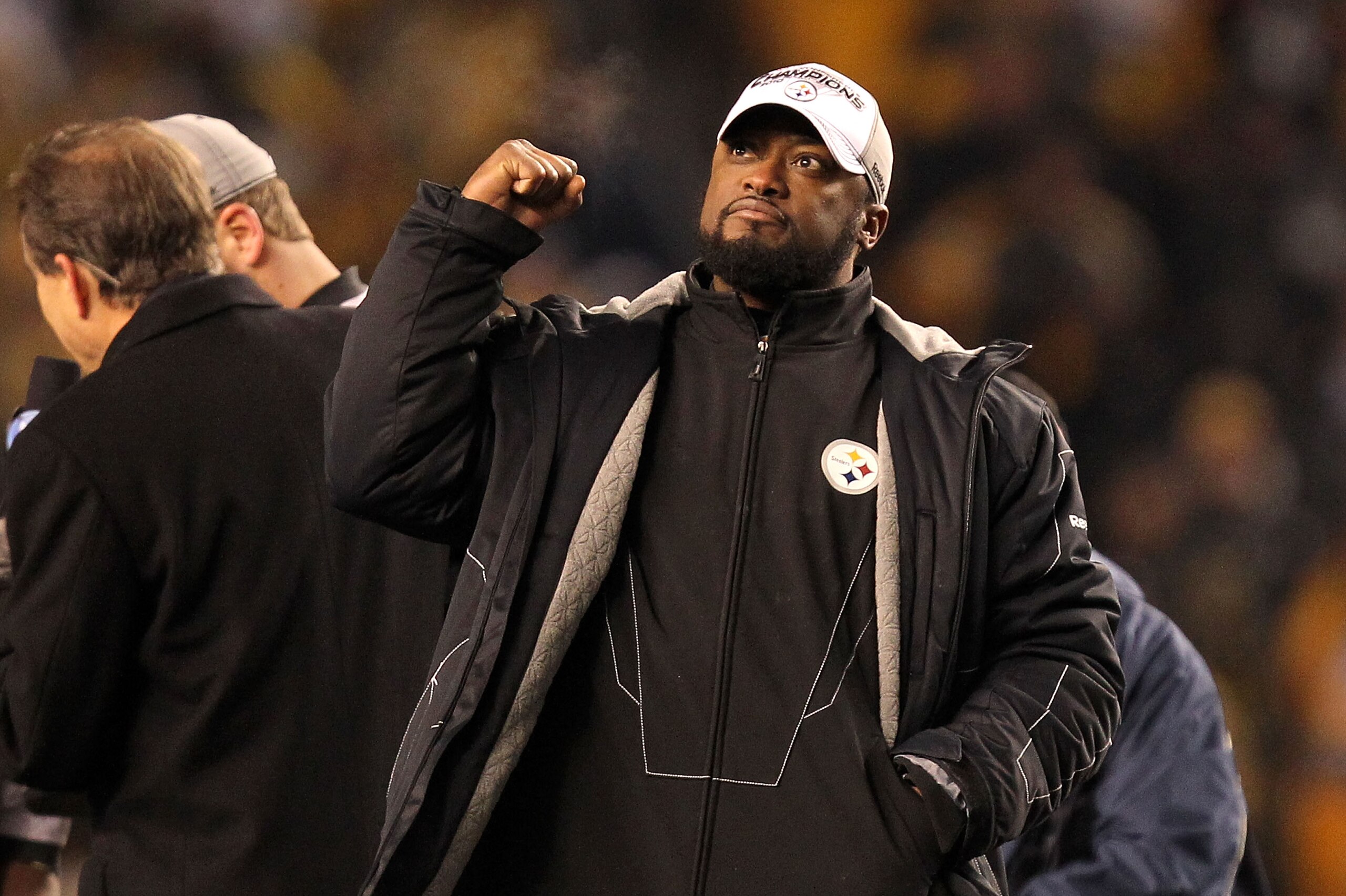 PITTSBURGH, PA - JANUARY 23:  Head coach Mike Tomlin of the Pittsburgh Steelers celebrates after the Steelers defeated the New York Jets 24 to 19 in the 2011 AFC Championship game at Heinz Field on January 23, 2011 in Pittsburgh, Pennsylvania.  (Photo by