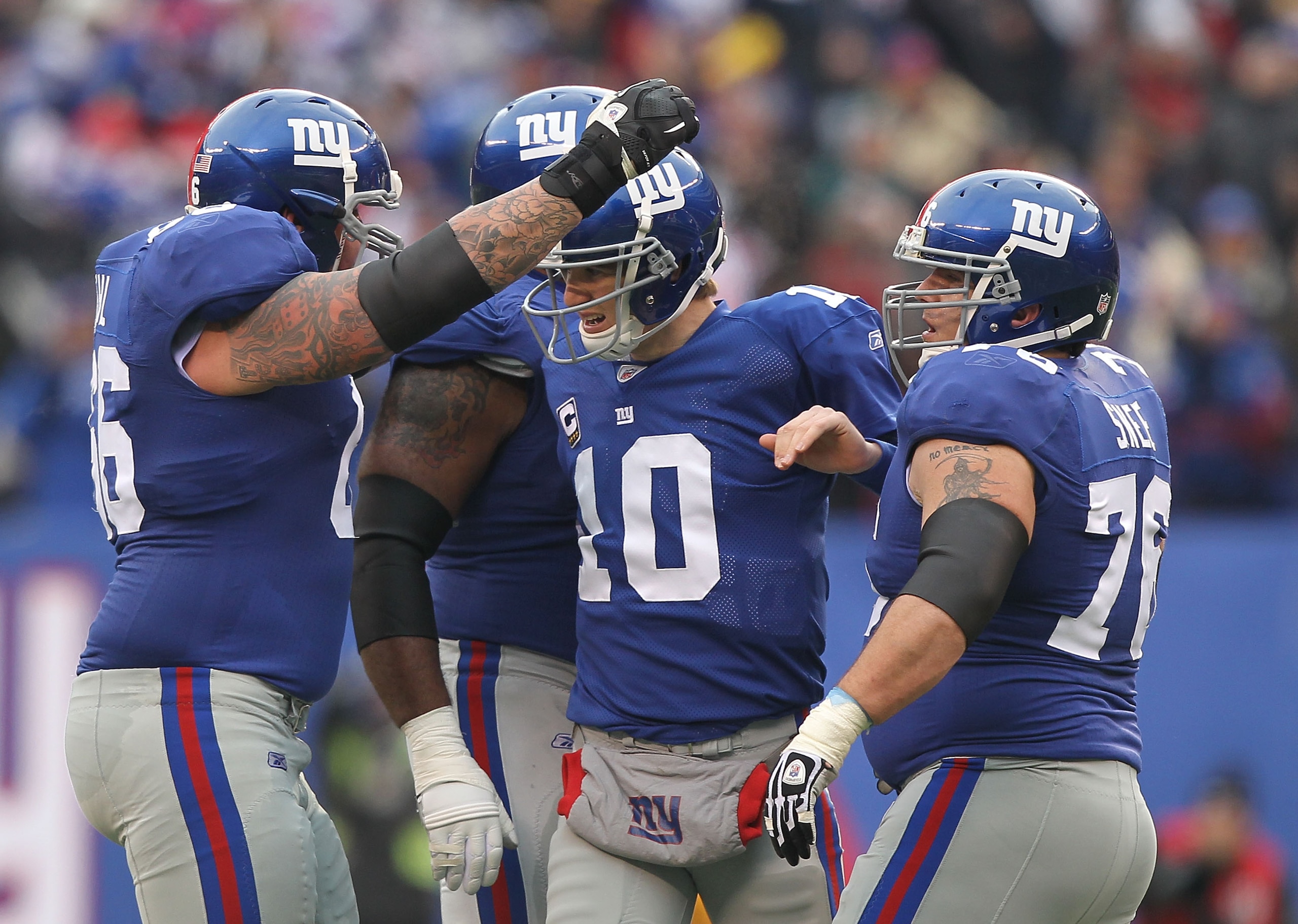 EAST RUTHERFORD, NJ - DECEMBER 19: Eli Manning #10 of the New York Giants celebrates a touchdown by Mario Manningham against  the Philadelphia Eagles during their game on December 19, 2010 at The New Meadowlands Stadium in East Rutherford, New Jersey.  (P