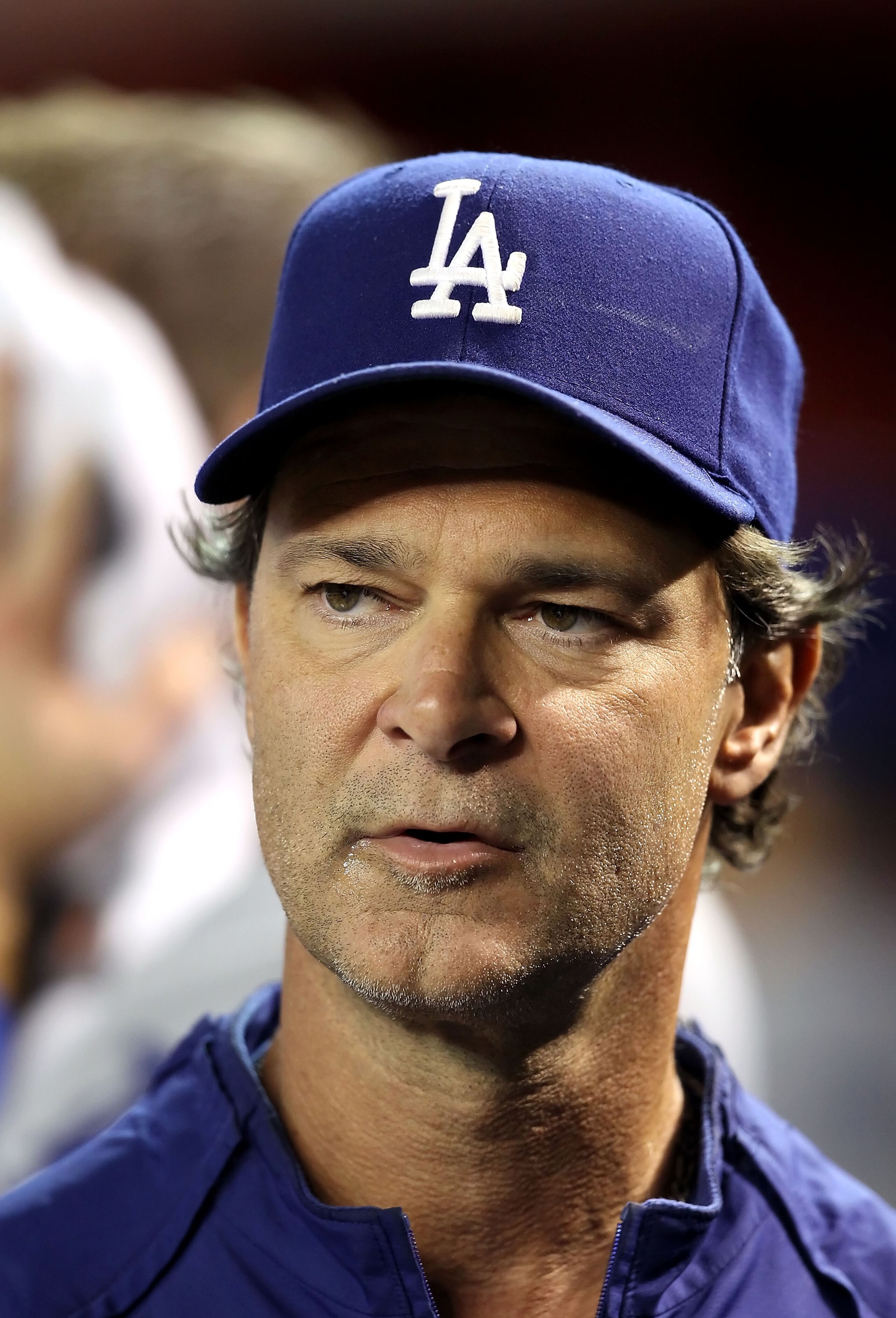 PHOENIX - SEPTEMBER 24:  Don Mattingly of the Los Angeles Dodgers sits in the dugout during the Major League Baseball game against the Arizona Diamondbacks at Chase Field on September 24, 2010 in Phoenix, Arizona.   The Dodgers defeated the Diamondbacks 3