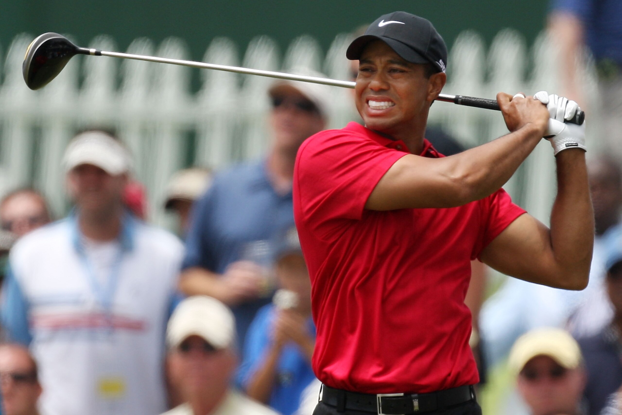 SAN DIEGO - JUNE 15: Tiger Woods winces due to the pain from his knee injury after his tee shot during the final round of the 108th U.S. Open at the Torrey Pines Golf Course (South Course) on June 15, 2008 in San Diego, California. (Photo by Ross Kinnai SAN DIEGO - JUNE 15: Tiger Woods winces due to the pain from his knee injury after his tee shot during the final round of the 108th U.S. Open at the Torrey Pines Golf Course (South Course) on June 15, 2008 in San Diego, California. (Photo by Ross Kinnai