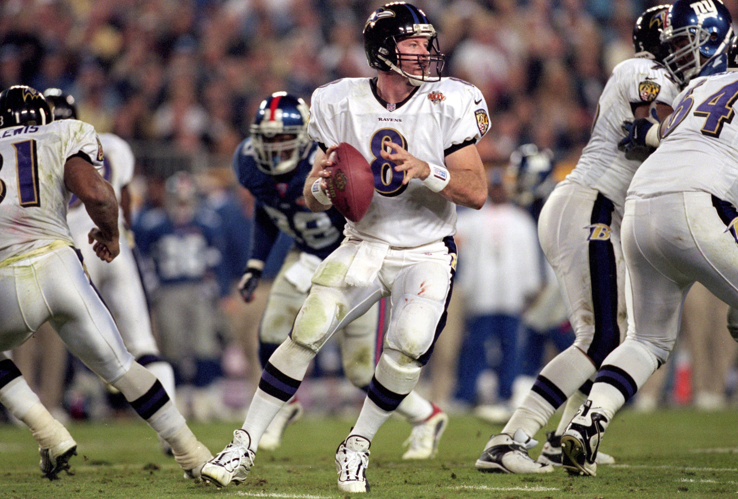28 Jan 2001:  Trent Dilfer #8 of the Baltimore Ravens drops back to pass the ball during the Super Bowl XXXV Game against the New York Giants at the Raymond James Stadium in Tampa, Florida. The Ravens defeated the Giants 34-7.Mandatory Credit: Andy Lyons