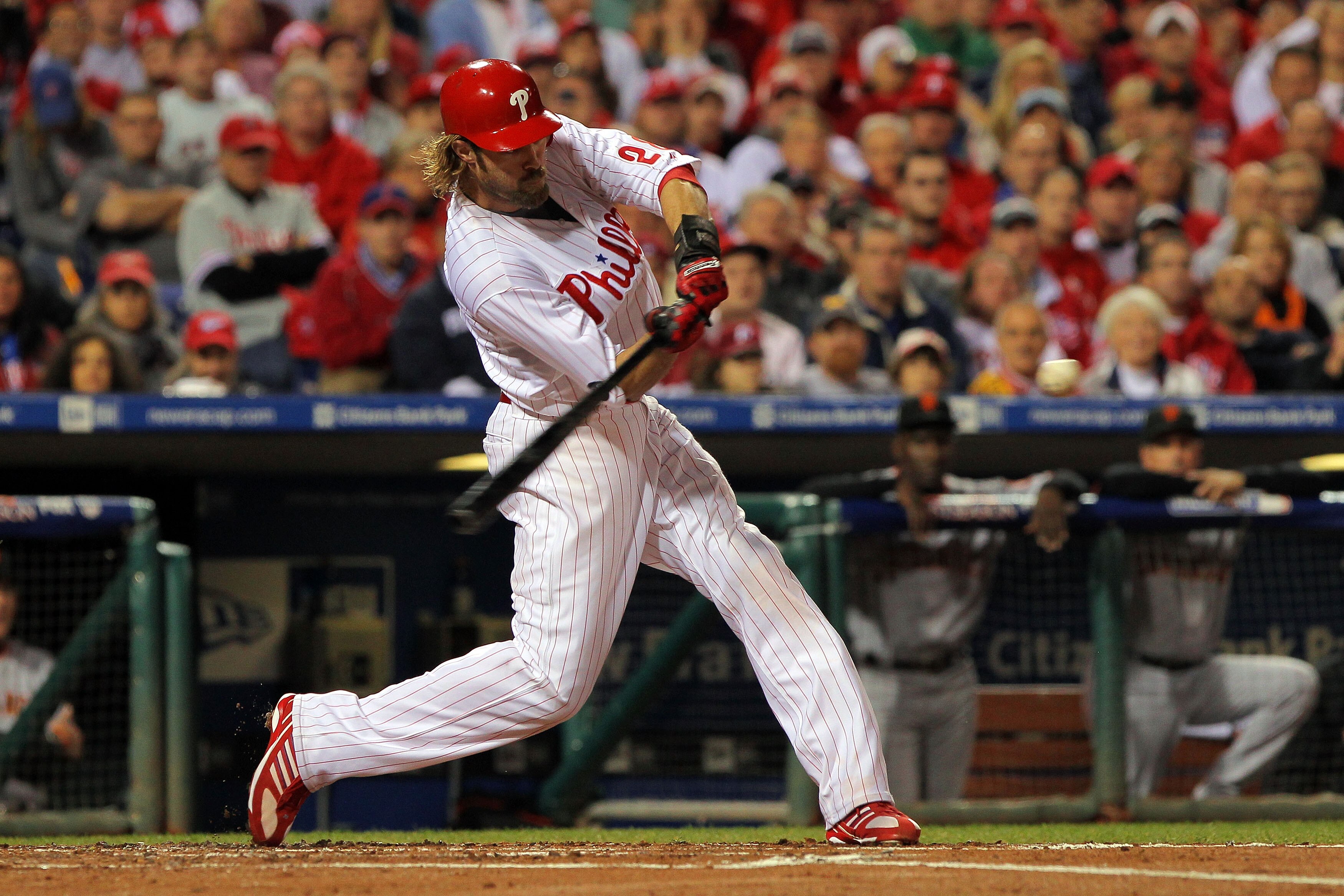 PHILADELPHIA - OCTOBER 23:  Jayson Werth #28 of the Philadelphia Phillies connects for a first inning sacrifice fly against the San Francisco Giants in Game Six of the NLCS during the 2010 MLB Playoffs at Citizens Bank Park on October 23, 2010 in Philadel