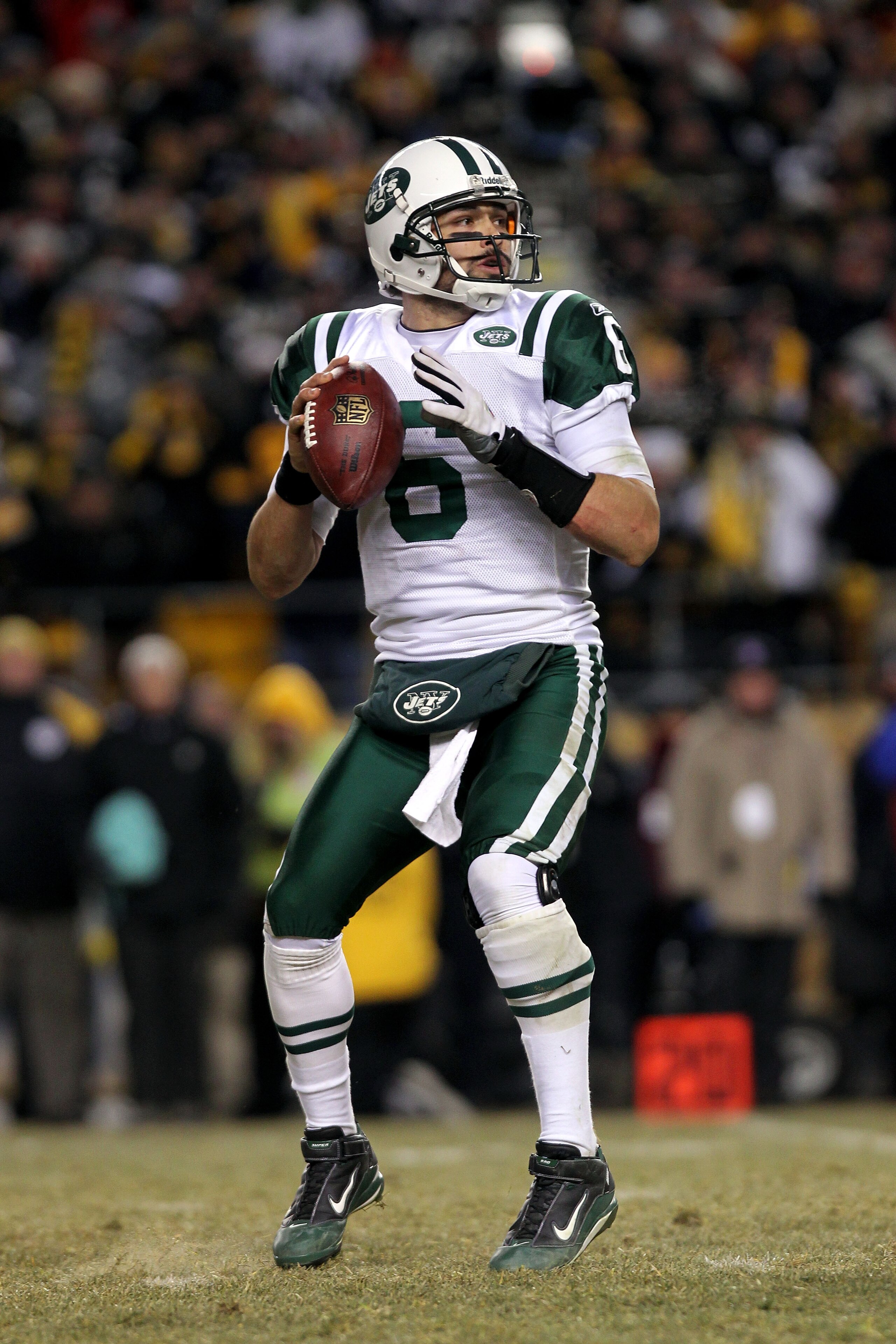 PITTSBURGH, PA - JANUARY 23:  Quarterback Mark Sanchez #6 of the New York Jets looks to pass against the Pittsburgh Steelers during the 2011 AFC Championship game at Heinz Field on January 23, 2011 in Pittsburgh, Pennsylvania. The Steelers won 24-19.  (Ph