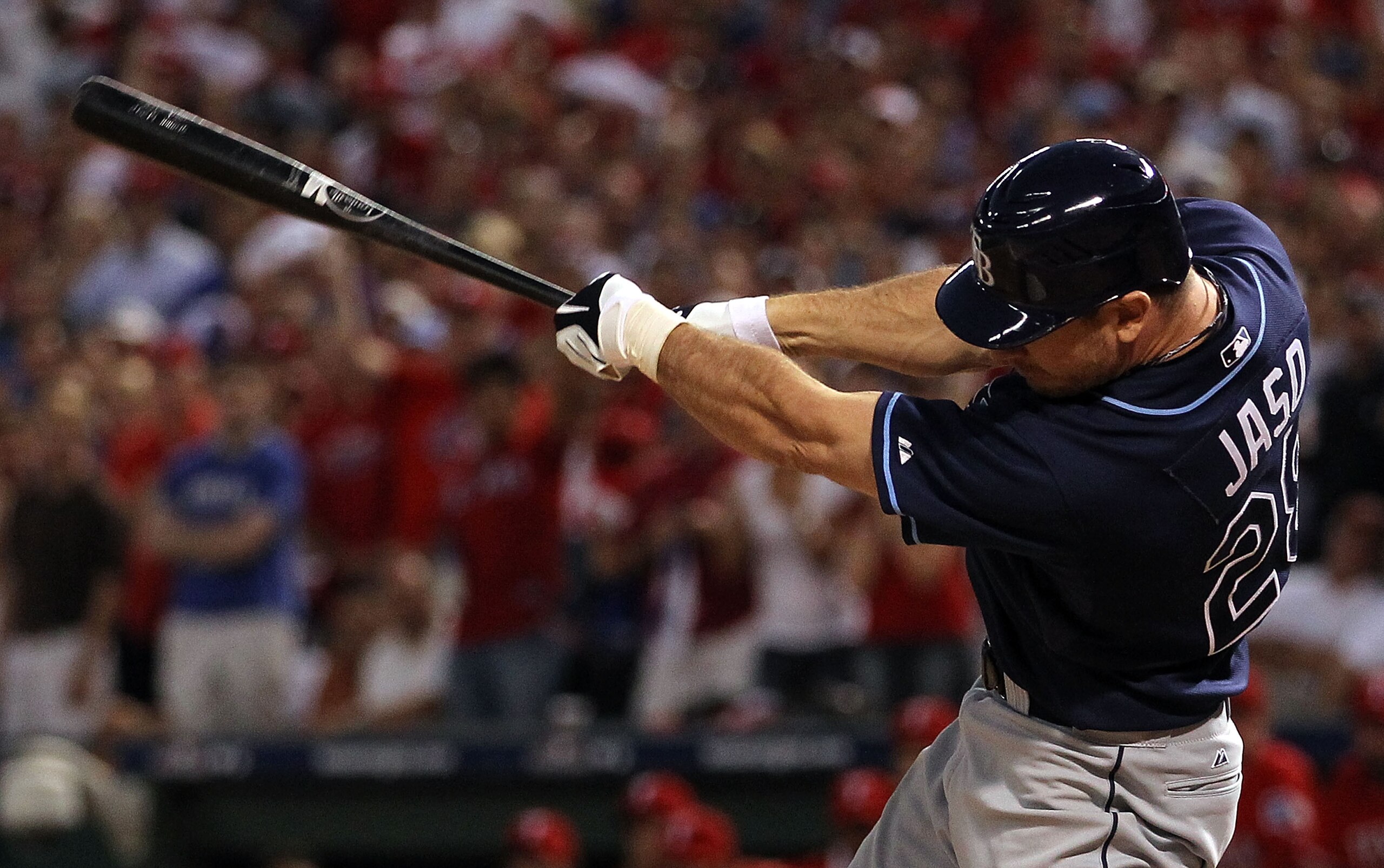ARLINGTON, TX - OCTOBER 09: Catcher John Jaso #28 of the Tampa Bay Rays hits a RBI single against the Texas Rangers in the 8th inning during game 3 of the ALDS at Rangers Ballpark in Arlington on October 9, 2010 in Arlington, Texas. (Photo by Ronald Mar ARLINGTON, TX - OCTOBER 09: Catcher John Jaso #28 of the Tampa Bay Rays hits a RBI single against the Texas Rangers in the 8th inning during game 3 of the ALDS at Rangers Ballpark in Arlington on October 9, 2010 in Arlington, Texas. (Photo by Ronald Mar