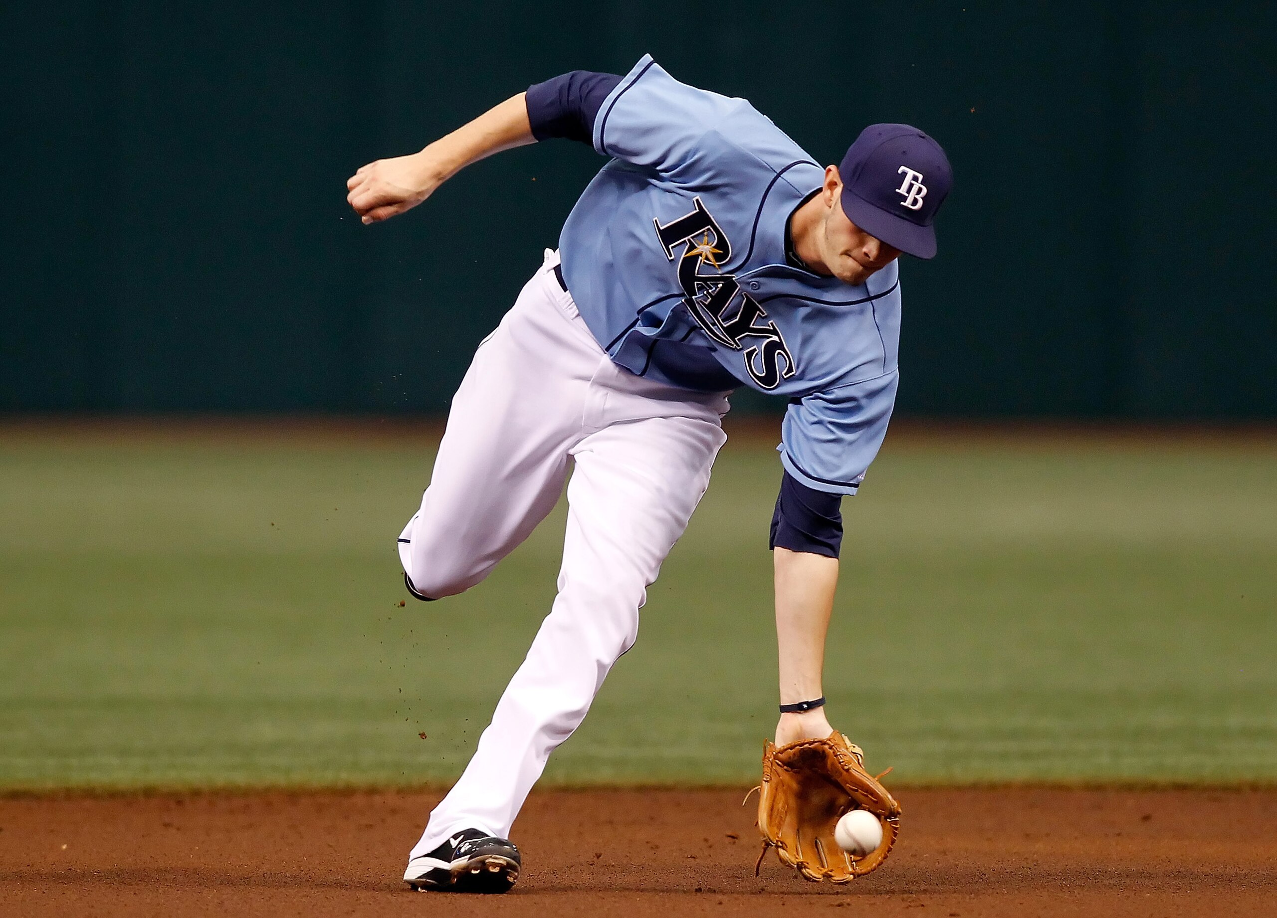 ST. PETERSBURG - JULY 11: Shortstop Reid Brignac #15 of the Tampa Bay Rays fields a ground ball against the Cleveland Indians at Tropicana Field on July 11, 2010 in St. Petersburg, Florida. (Photo by J. Meric/Getty Images) ST. PETERSBURG - JULY 11: Shortstop Reid Brignac #15 of the Tampa Bay Rays fields a ground ball against the Cleveland Indians at Tropicana Field on July 11, 2010 in St. Petersburg, Florida. (Photo by J. Meric/Getty Images)