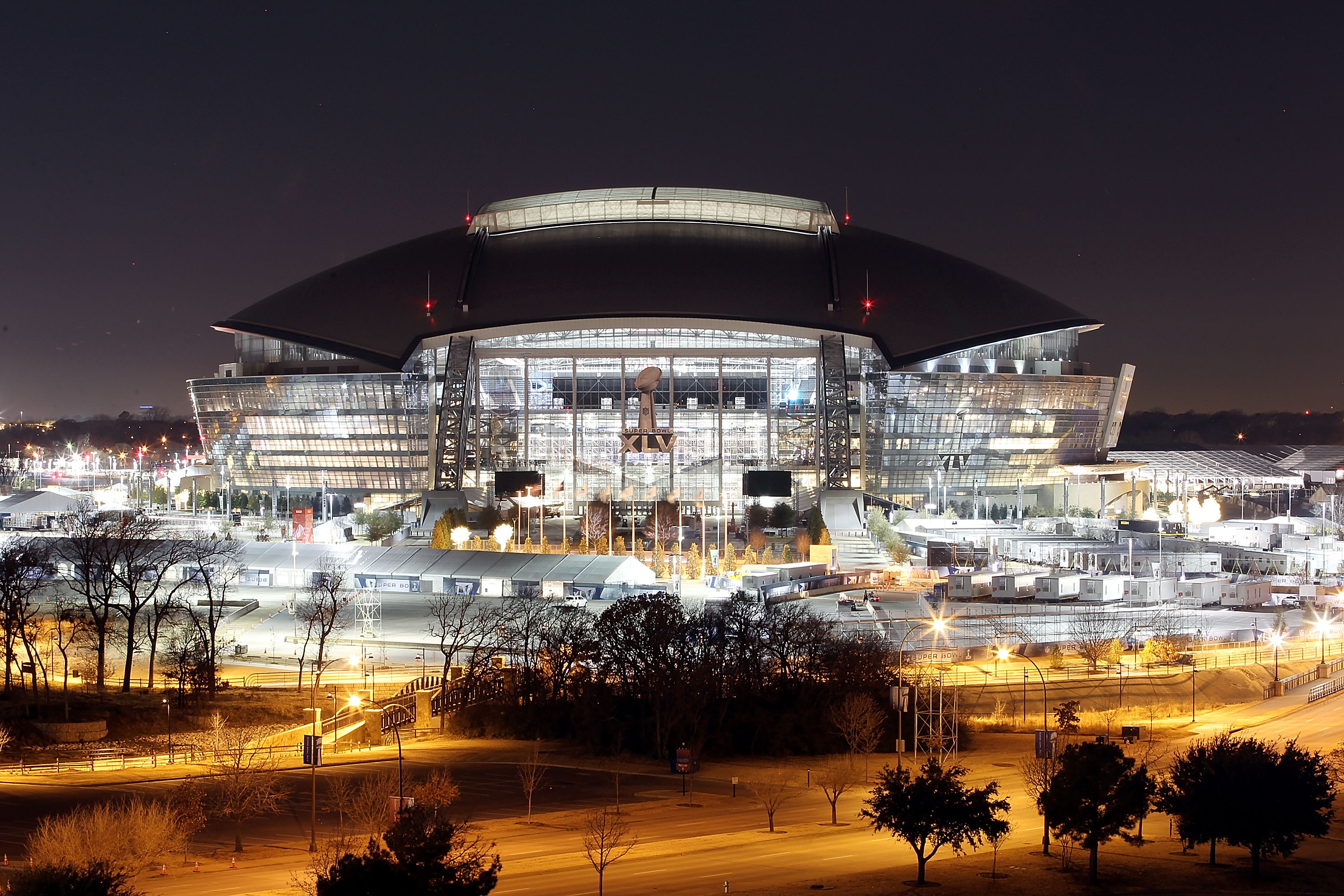 ARLINGTON, TX - JANUARY 26:  A view of Cowboys Stadium at night on January 26, 2011 in Arlington, Texas.  North Texas will host Super Bowl XLV  between the Pittsburgh Steelers and the Green Bay Packers at Cowboys Stadium on February 6, 2011 in Arlington,
