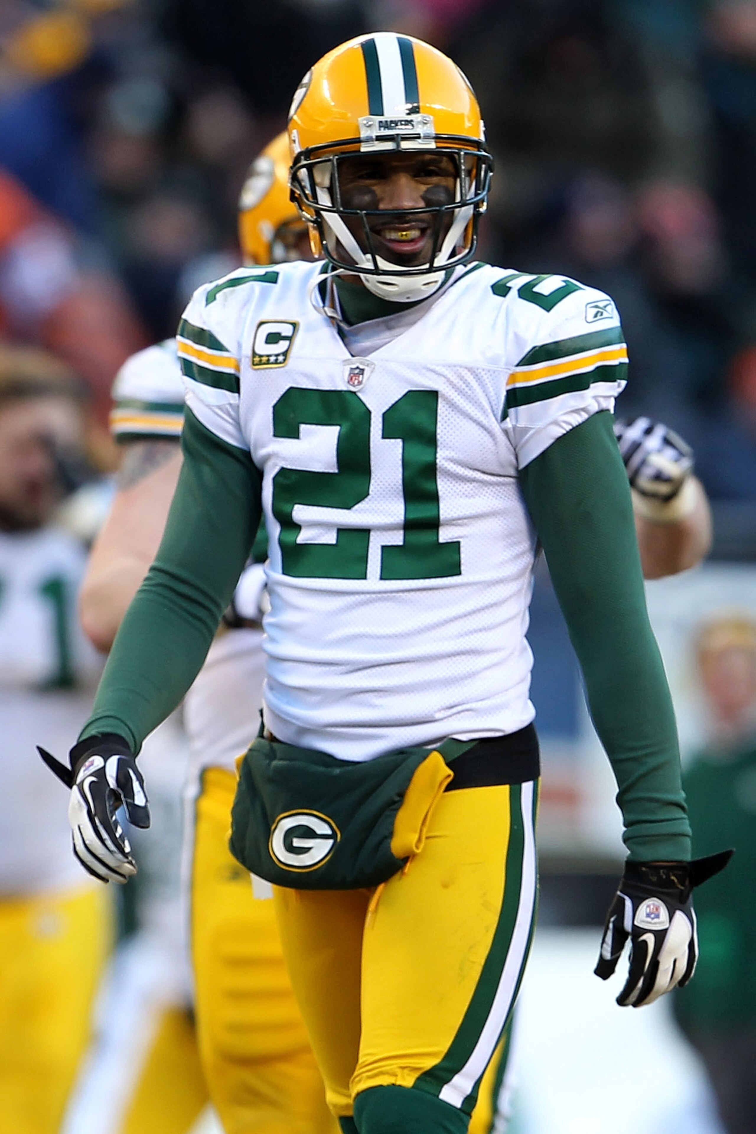 CHICAGO, IL - JANUARY 23: Charles Woodson #21 of the Green Bay Packers smiles while taking on the Chicago Bears in the NFC Championship Game at Soldier Field on January 23, 2011 in Chicago, Illinois. (Photo by Jamie Squire/Getty Images) CHICAGO, IL - JANUARY 23: Charles Woodson #21 of the Green Bay Packers smiles while taking on the Chicago Bears in the NFC Championship Game at Soldier Field on January 23, 2011 in Chicago, Illinois. (Photo by Jamie Squire/Getty Images)