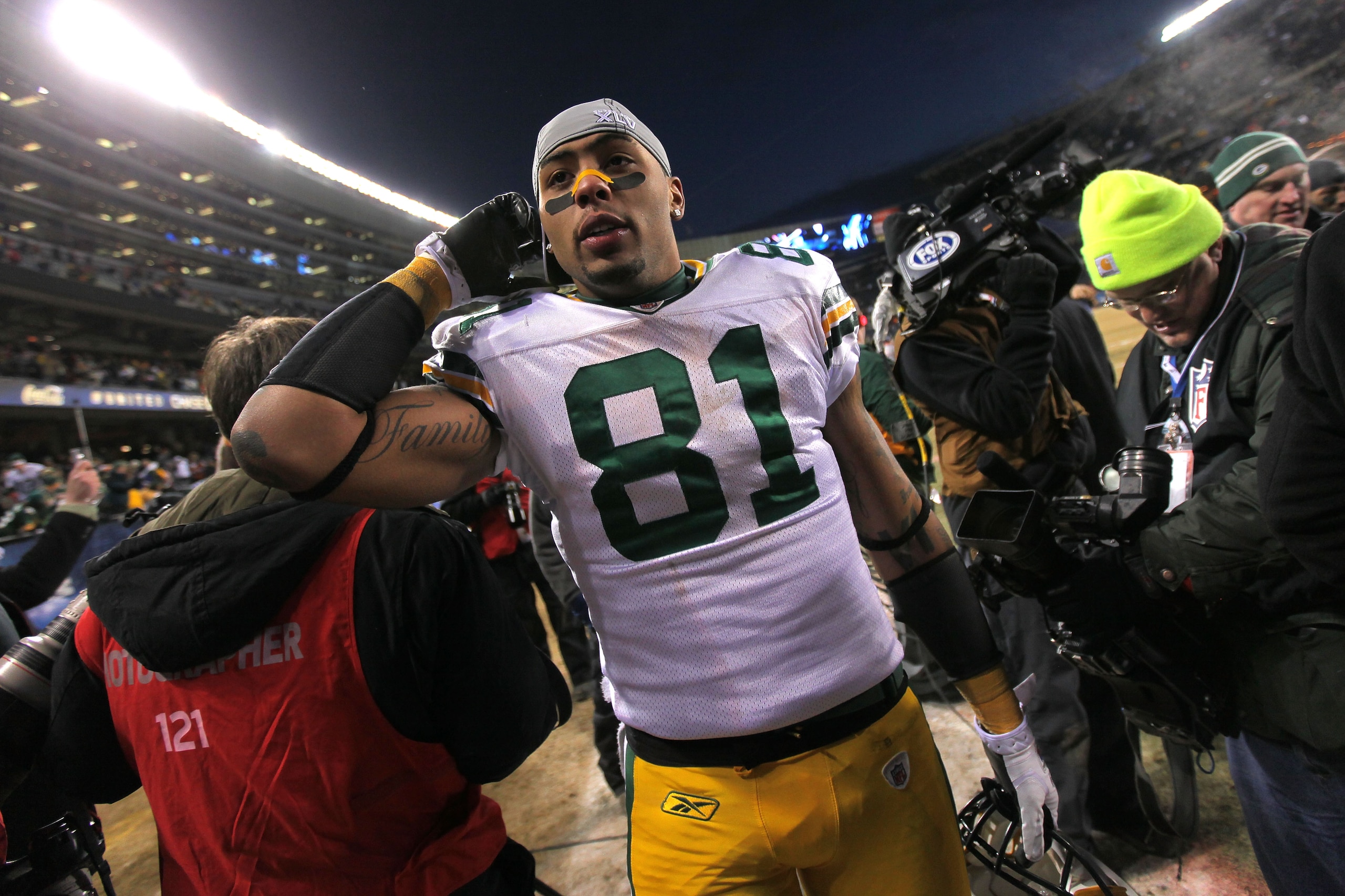 CHICAGO, IL - JANUARY 23: Andrew Quarless #81 of the Green Bay Packers celebrates after the Packers 21-14 victory against the Chicago Bears in the NFC Championship Game at Soldier Field on January 23, 2011 in Chicago, Illinois. (Photo by Doug Pensinger/ CHICAGO, IL - JANUARY 23: Andrew Quarless #81 of the Green Bay Packers celebrates after the Packers 21-14 victory against the Chicago Bears in the NFC Championship Game at Soldier Field on January 23, 2011 in Chicago, Illinois. (Photo by Doug Pensinger/