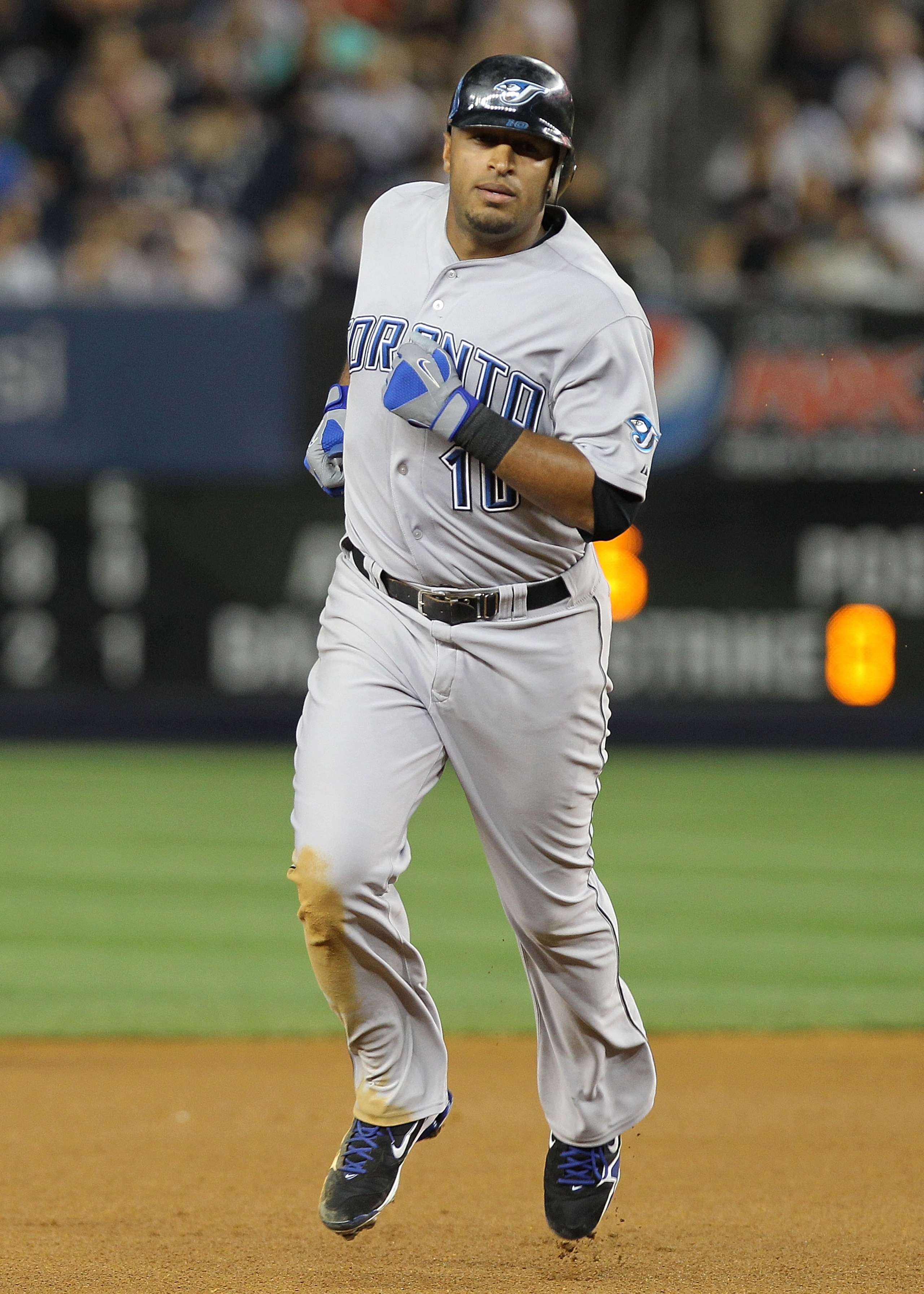 NEW YORK - AUGUST 03: Vernon Wells #10 of the Toronto Blue Jays rounds the bases on his eighth inning home run against the New York Yankees at Yankee Stadium on August 3, 2010 in the Bronx borough of New York City.  (Photo by Nick Laham/Getty Images)