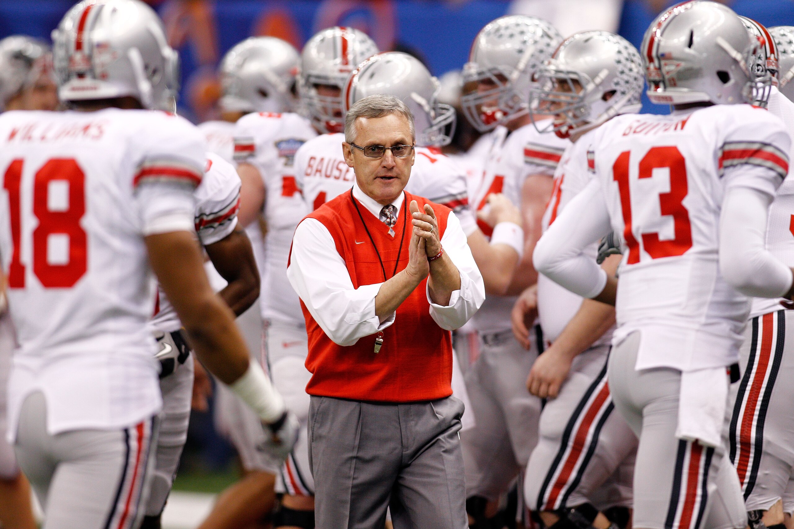 NEW ORLEANS, LA - JANUARY 04: Head coach Jim Tressel of the Ohio State Buckeyes gathers his team before the Allstate Sugar Bowl against the Arkansas Razorbacks at the Louisiana Superdome on January 4, 2011 in New Orleans, Louisiana. (Photo by Chris Gray NEW ORLEANS, LA - JANUARY 04: Head coach Jim Tressel of the Ohio State Buckeyes gathers his team before the Allstate Sugar Bowl against the Arkansas Razorbacks at the Louisiana Superdome on January 4, 2011 in New Orleans, Louisiana. (Photo by Chris Gray