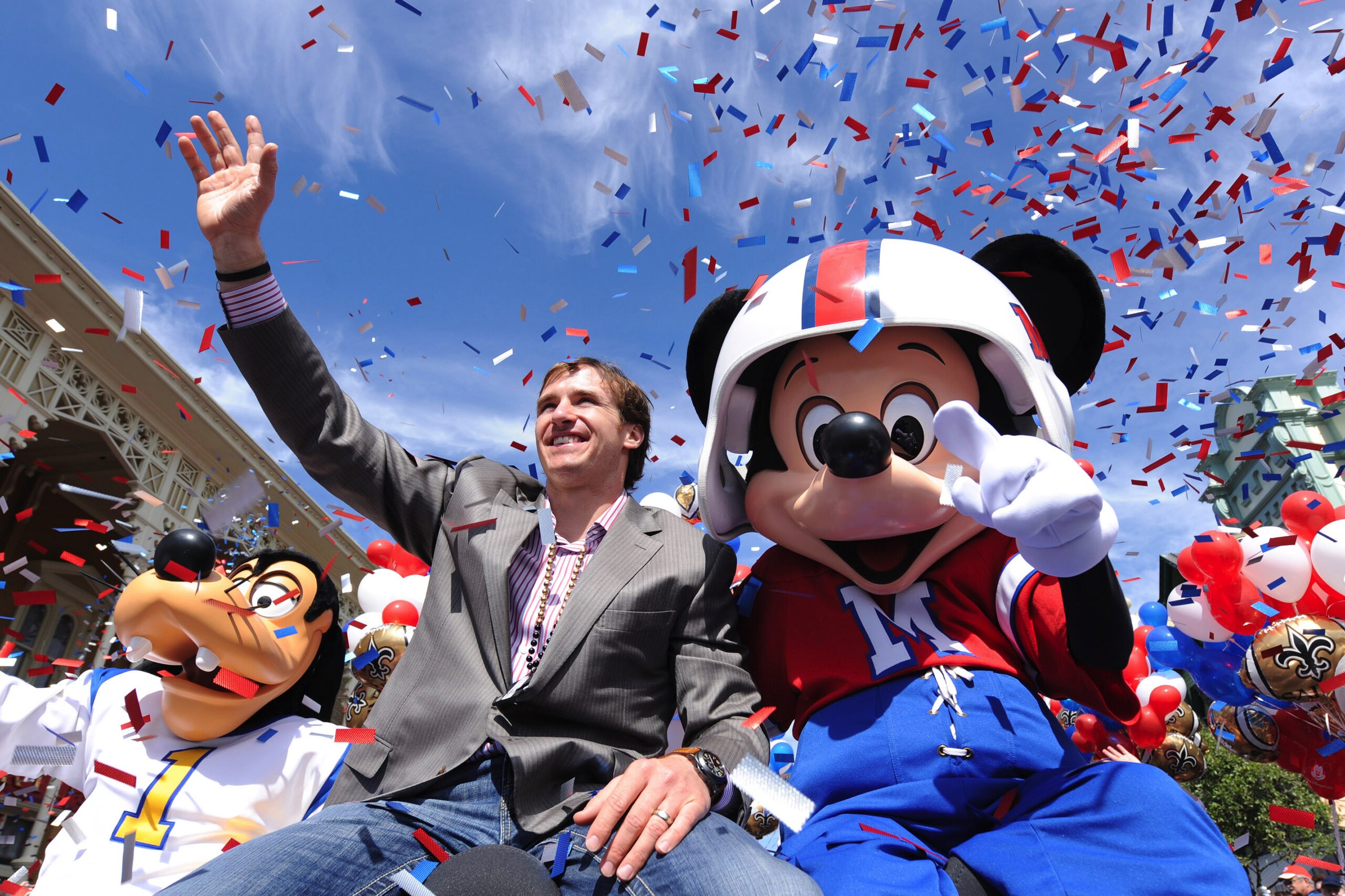 LAKE BUENA VISTA, FL - FEBRUARY 08:  In this handout photo provided by Disney, Super Bowl XLIV MVP Drew Brees joins Mickey Mouse in a celebratory parade in the Magic Kingdom on February 8, 2010 in Lake Buena Vista, Florida.  Brees, the quarterback of the