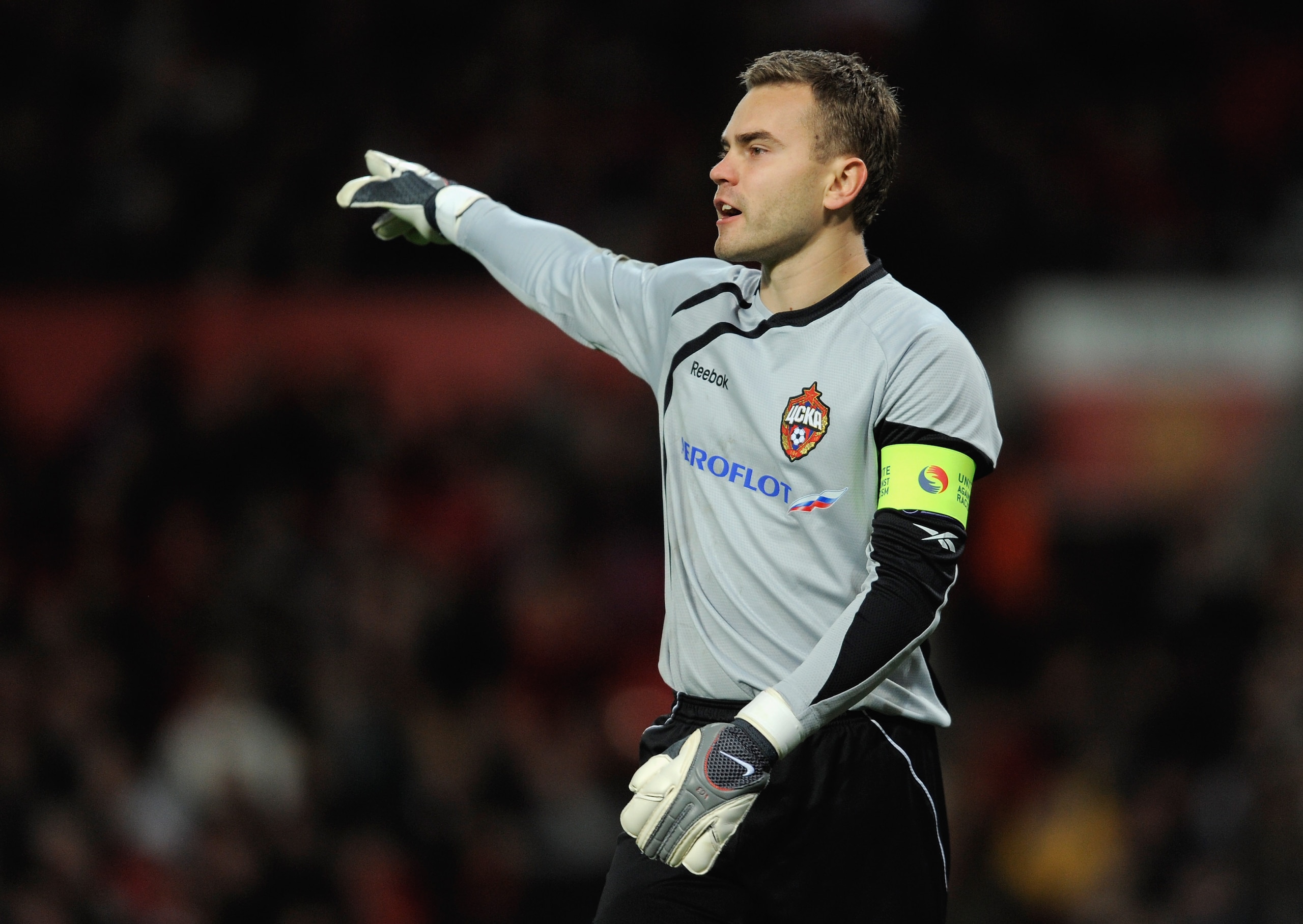 MANCHESTER, ENGLAND - NOVEMBER 03:  Igor Akinfeev of CSKA Moscow issues instructions during the UEFA Champions League Group B match between Manchester United and CSKA Moscow at Old Trafford on November 3, 2009 in Manchester, England.  (Photo by Michael Re
