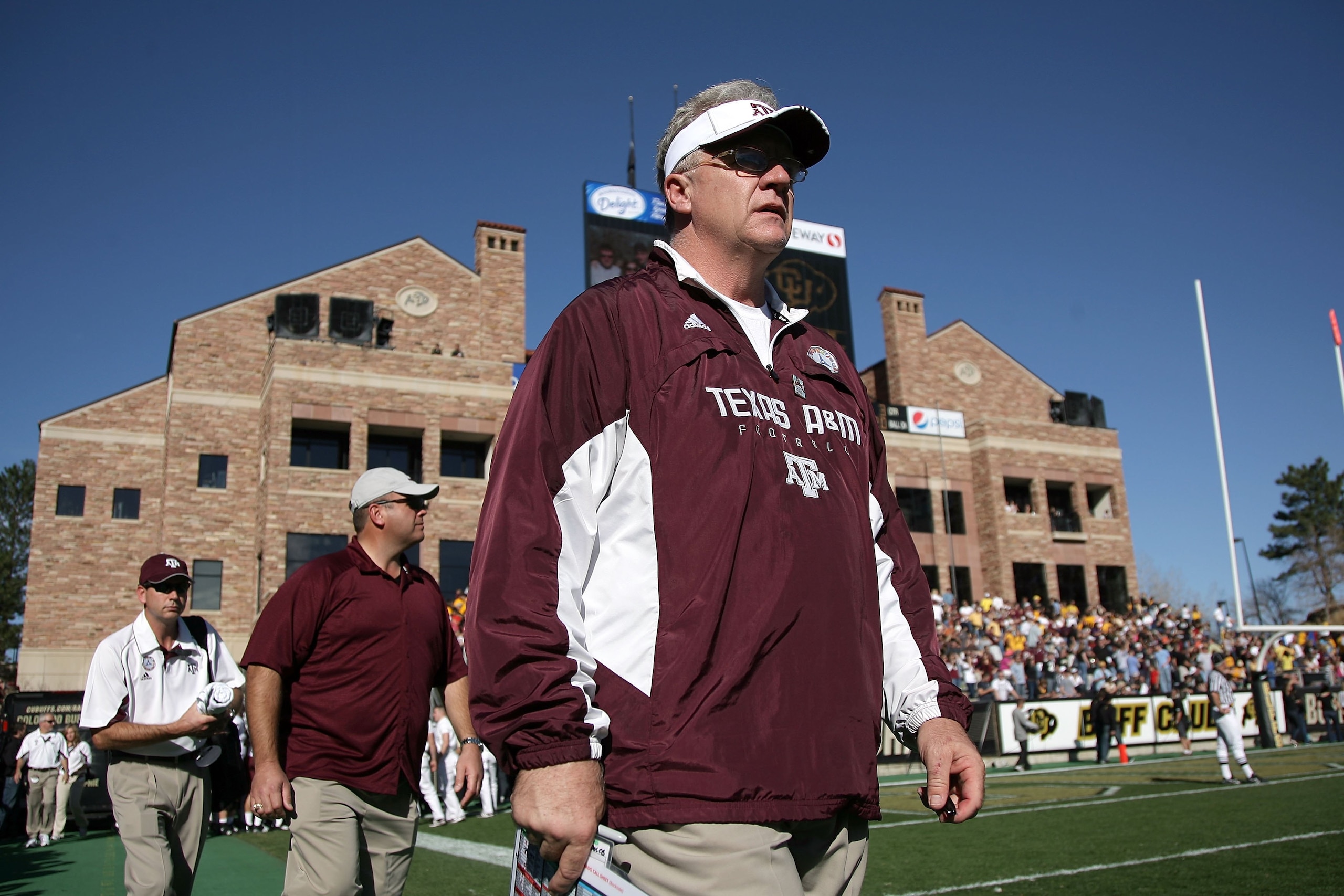 BOULDER, CO - NOVEMBER 07: Head coach Mike Sherman of the Texas A&M Aggies enters the field for the second half as he leads his team against the Colorado Buffaloes during NCAA college football action at Folsom Field on November 7, 2009 in Boulder, Colora BOULDER, CO - NOVEMBER 07: Head coach Mike Sherman of the Texas A&M Aggies enters the field for the second half as he leads his team against the Colorado Buffaloes during NCAA college football action at Folsom Field on November 7, 2009 in Boulder, Colora