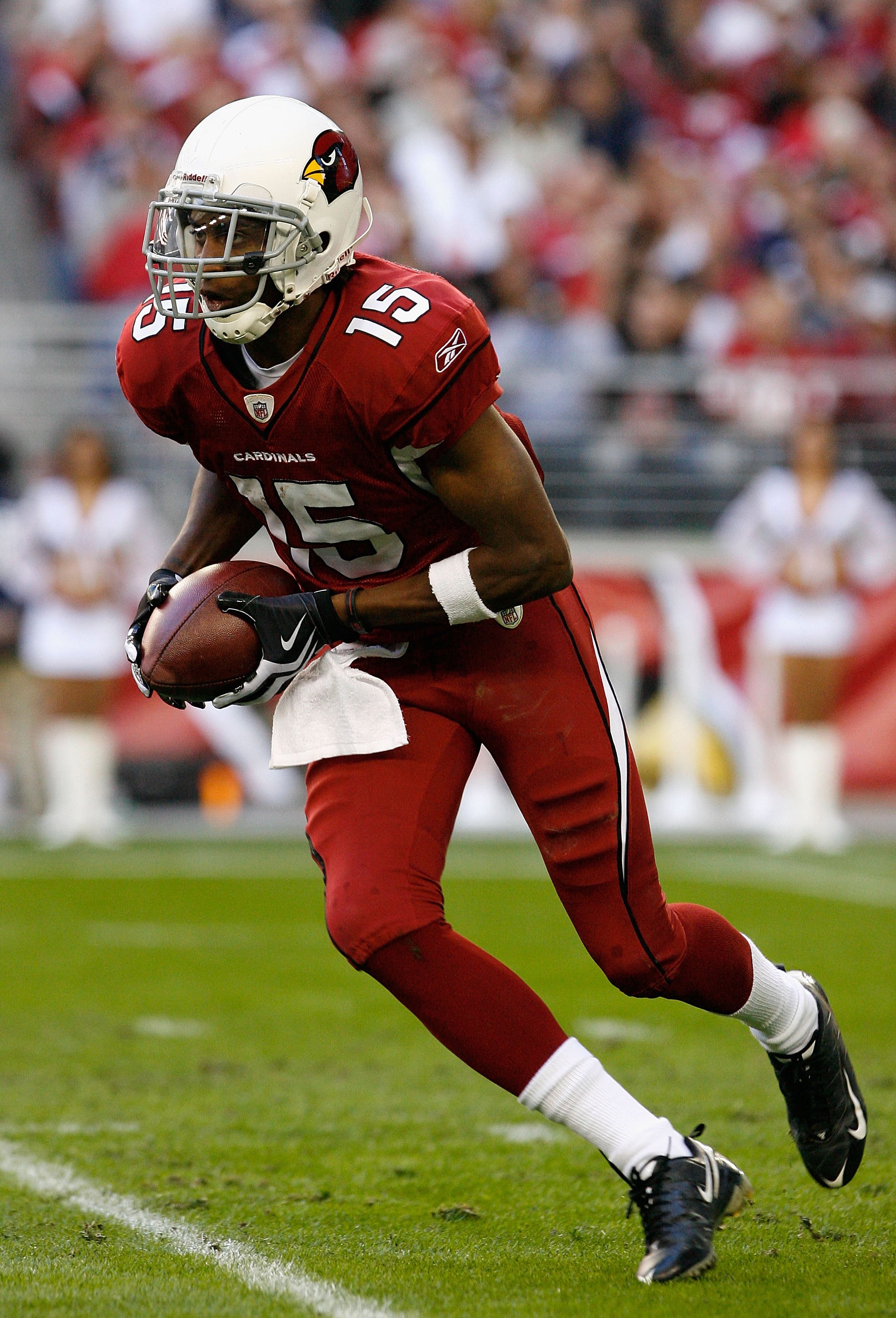 GLENDALE, AZ - DECEMBER 27:  Wide receiver Steve Breaston #15 of the Arizona Cardinals runs with the football during the NFL game against the St. Louis Rams at the Universtity of Phoenix Stadium on December 27, 2009 in Glendale, Arizona. The Cardinals def