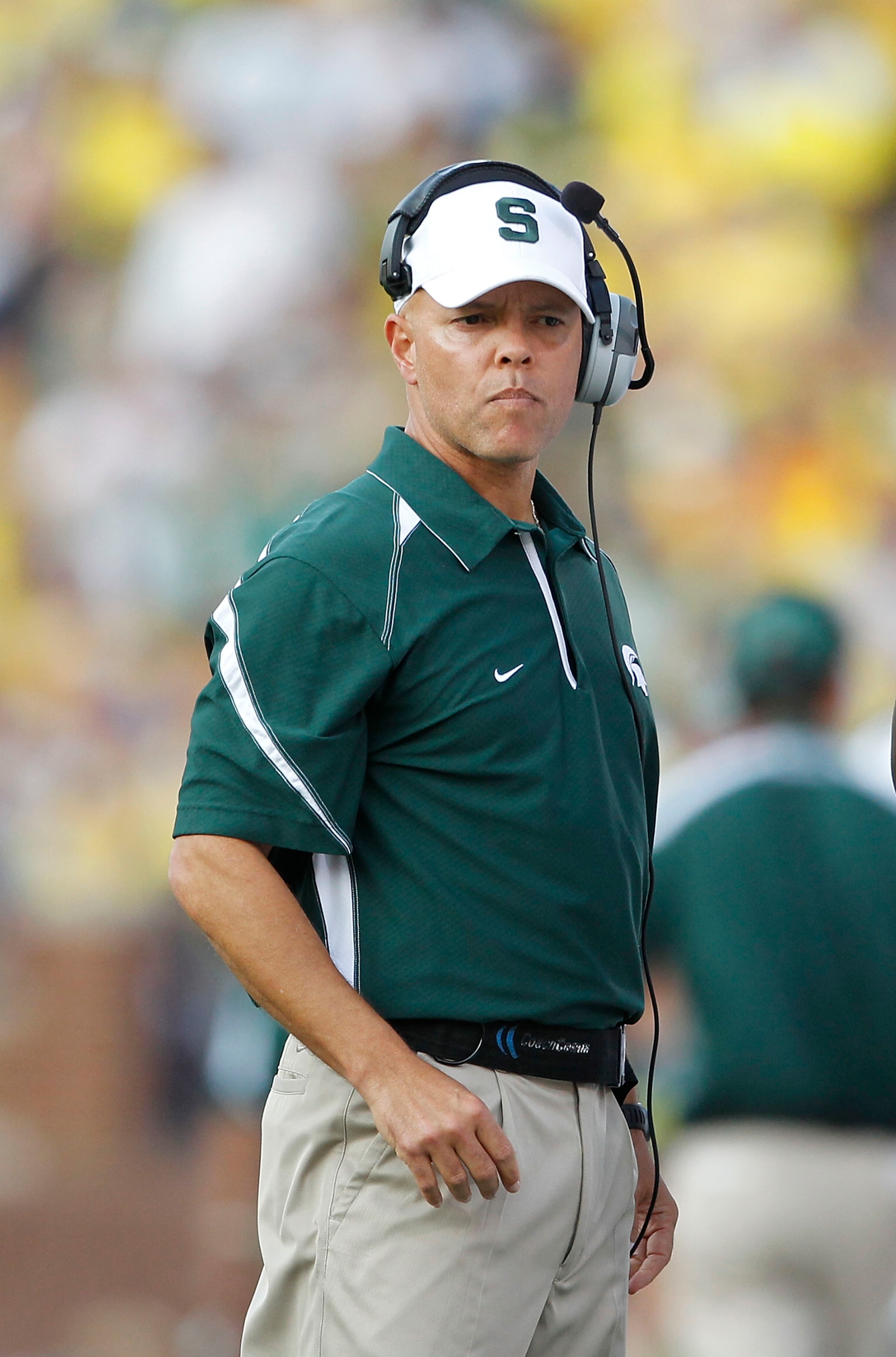 ANN ARBOR, MI - OCTOBER 09: Michigan State Spartans offensive coordinator Don Treadwell watches the action during the game against the Michigan Wolverines on October 9, 2010 at Michigan Stadium in Ann Arbor, Michigan. The Michigan Spartans defeated the M ANN ARBOR, MI - OCTOBER 09: Michigan State Spartans offensive coordinator Don Treadwell watches the action during the game against the Michigan Wolverines on October 9, 2010 at Michigan Stadium in Ann Arbor, Michigan. The Michigan Spartans defeated the M