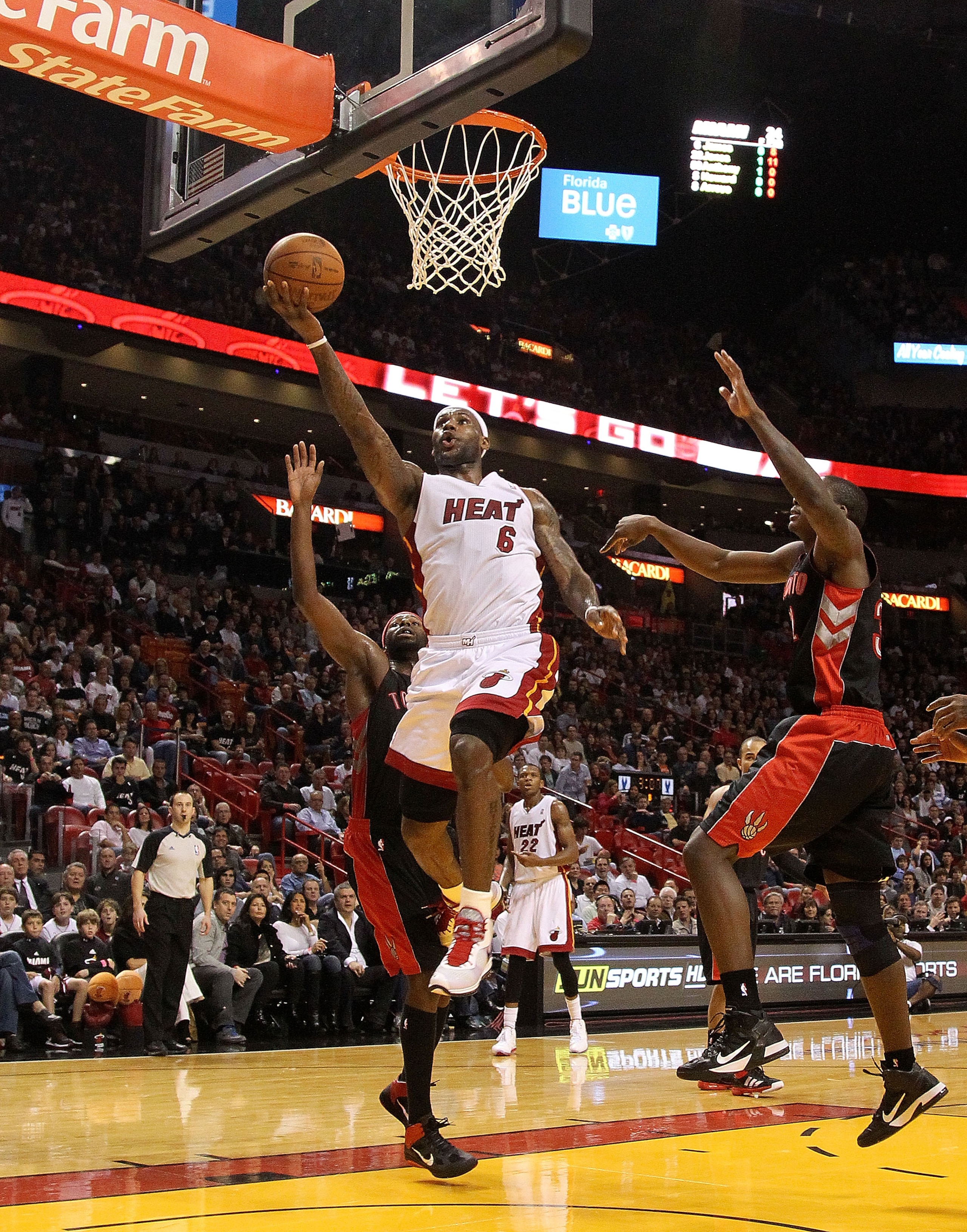 MIAMI, FL - JANUARY 22:  LeBron James #6 of the Miami Heat lays the ball in during a game against the Toronto Raptors at American Airlines Arena on January 22, 2011 in Miami, Florida. NOTE TO USER: User expressly acknowledges and agrees that, by downloadi