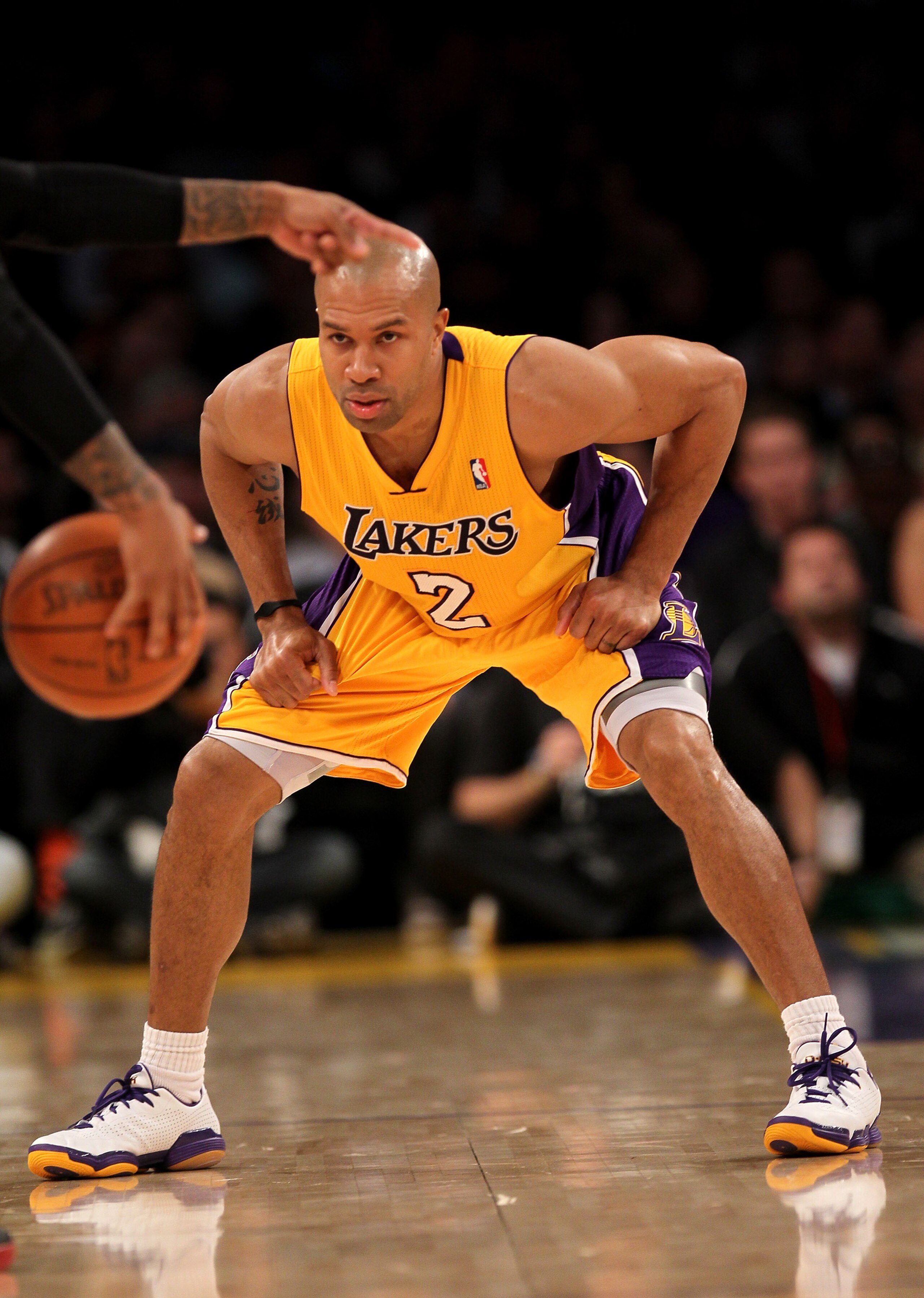 LOS ANGELES, CA - JANUARY 11:   Derek Fisher #2 of the Los Angeles Lakers sets up on defense against the Cleveland Cavaliers at Staples Center on January 11, 2011 in Los Angeles, California.  The Lakers won 112-57.  NOTE TO USER: User expressly acknowledg