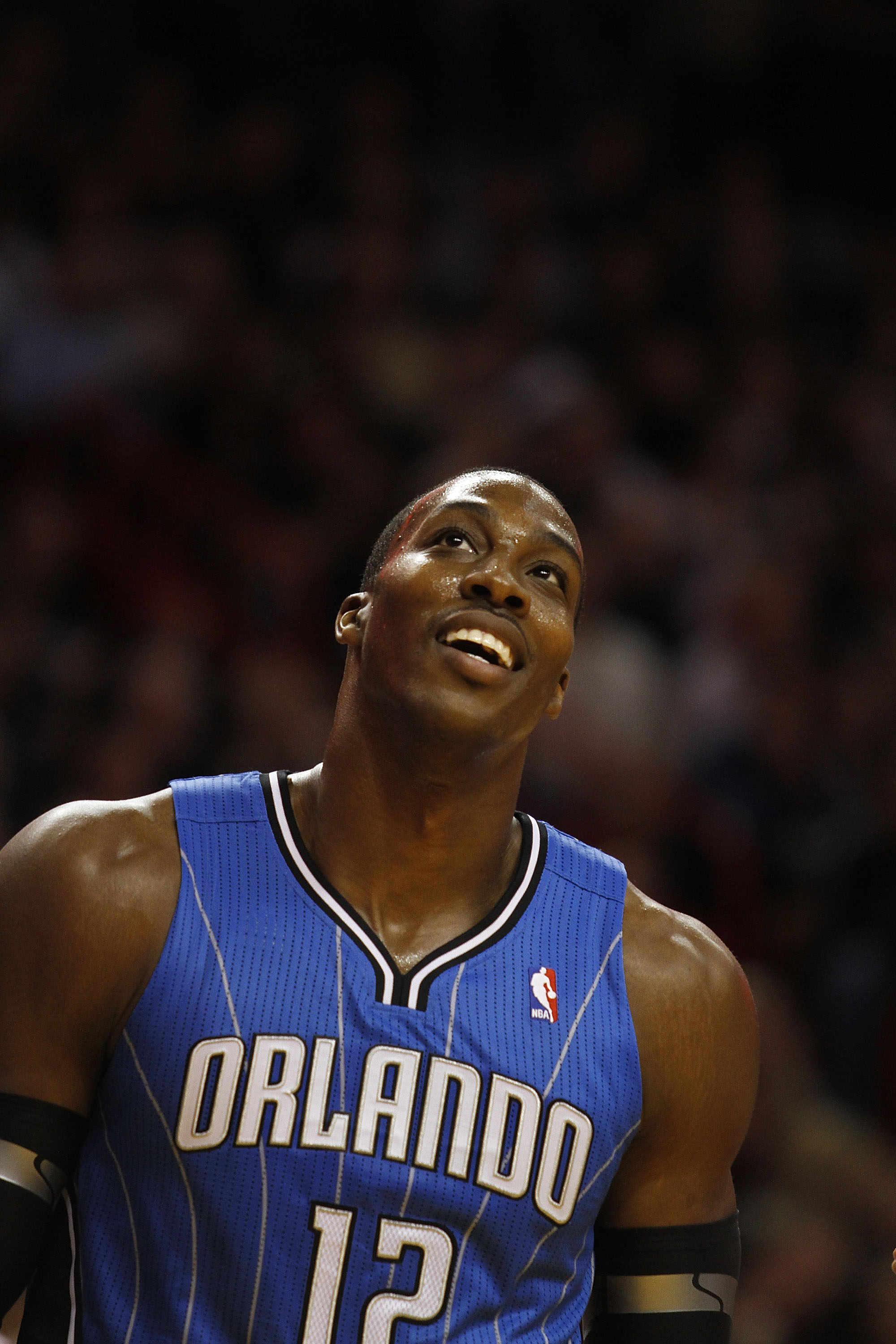 MIAMI - OCTOBER 29:  Center Dwight Howard #12  of the Orlando Magic dunks against the Miami Heat at American Airlines Arena on October 29, 2010 in Miami, Florida.  NOTE TO USER: User expressly acknowledges and agrees that, by downloading and or using this
