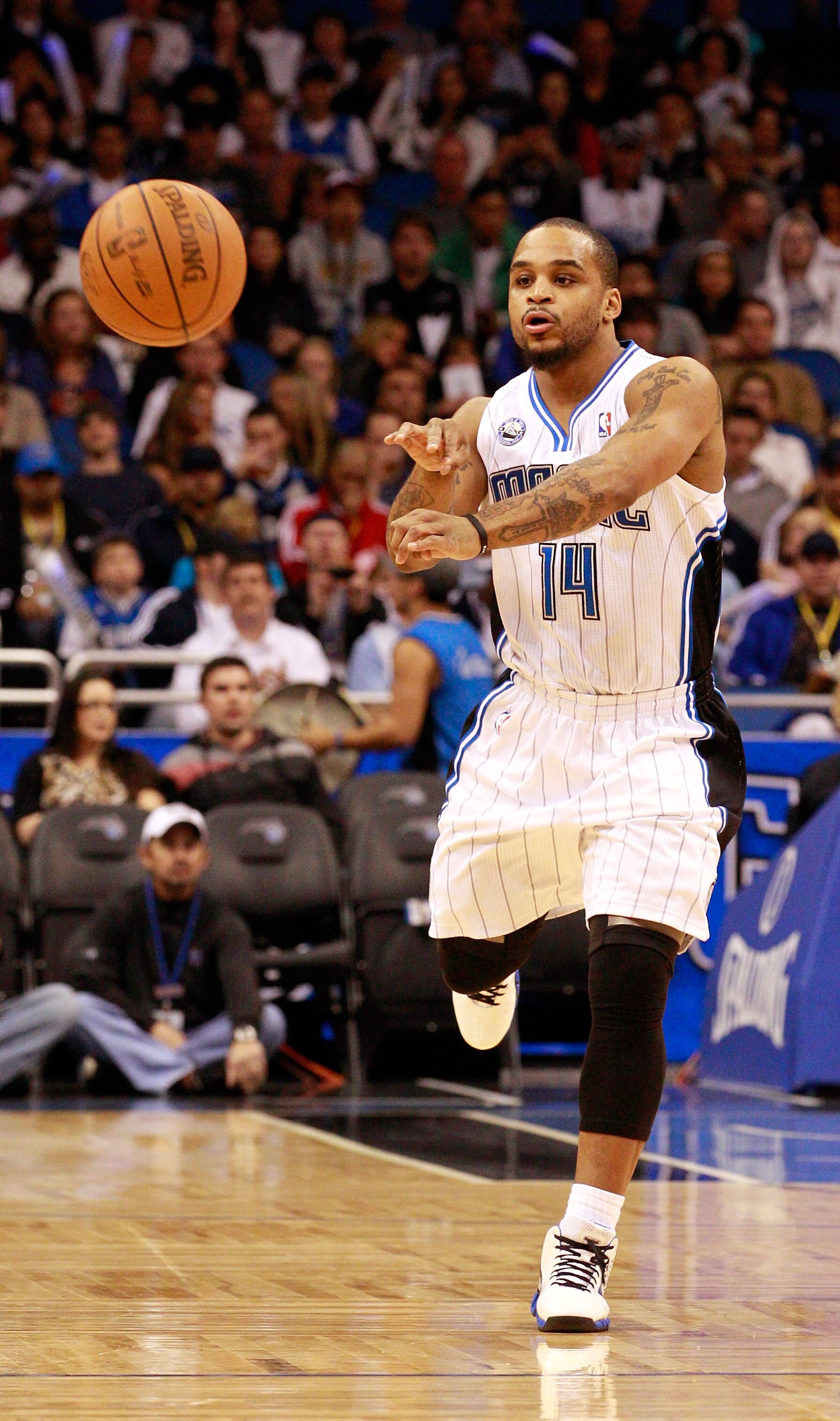 ORLANDO, FL - JANUARY 24:  Jameer Nelson #14 of the Orlando Magic passes the ball during the game against the Detroit Pistons at Amway Arena on January 24, 2011 in Orlando, Florida.  NOTE TO USER: User expressly acknowledges and agrees that, by downloadin