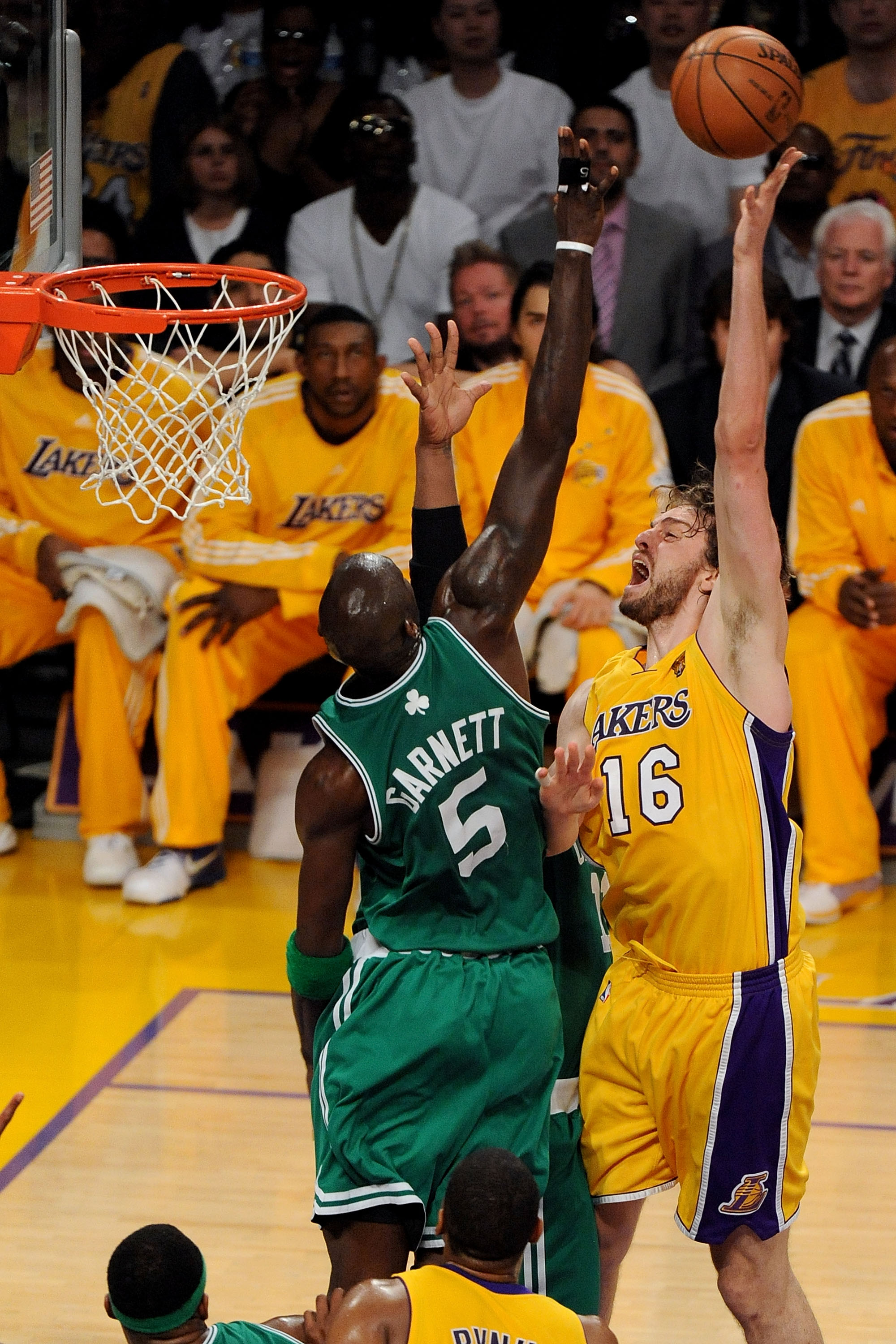 LOS ANGELES, CA - JUNE 17:  Pau Gasol #16 of the Los Angeles Lakers up for a shot over Kevin Garnett #5 of the Boston Celtics in Game Seven of the 2010 NBA Finals at Staples Center on June 17, 2010 in Los Angeles, California.  NOTE TO USER: User expressly