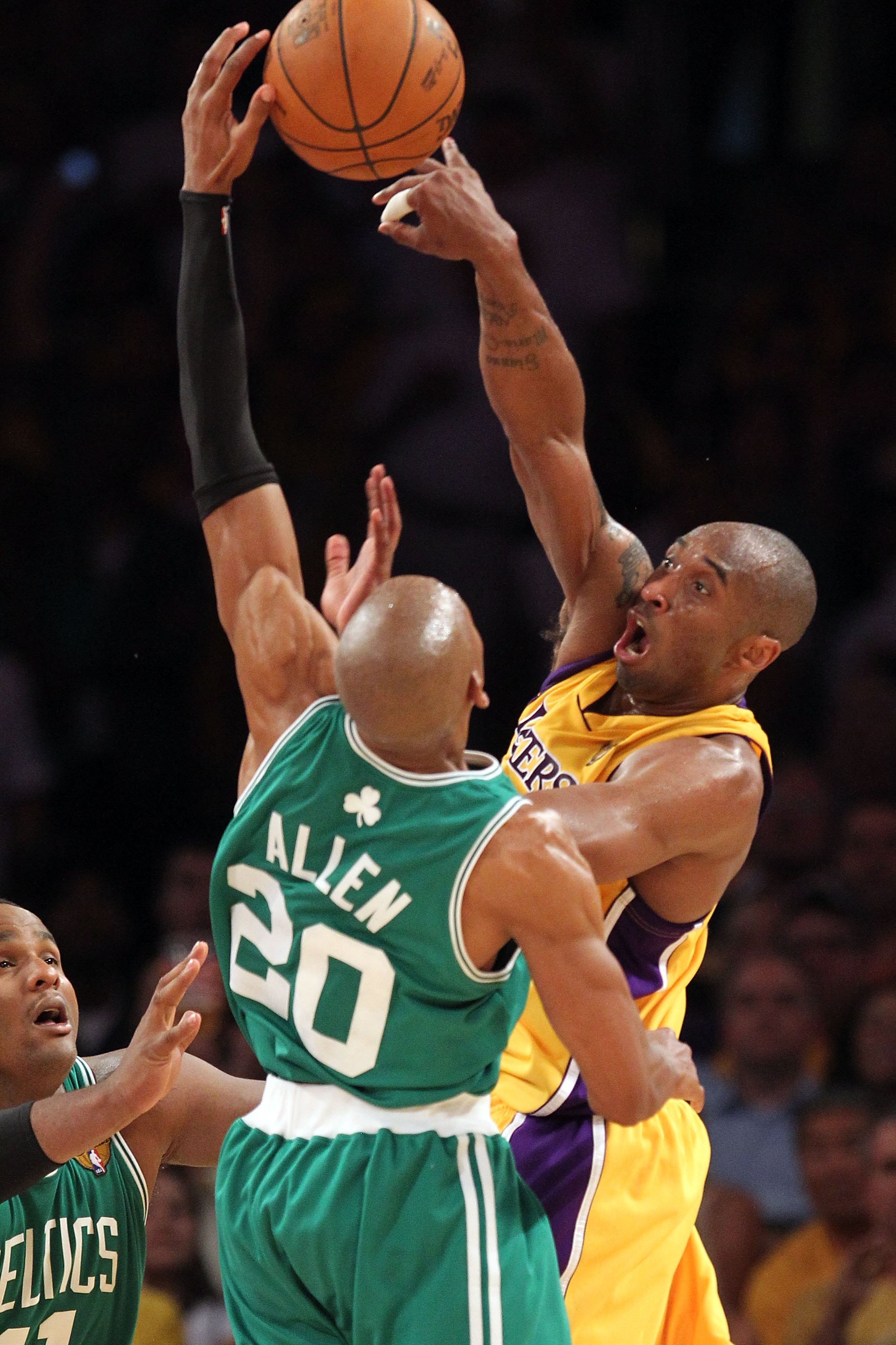 LOS ANGELES, CA - JUNE 17:  Kobe Bryant #24 of the Los Angeles Lakers moves the ball over Ray Allen #20 of the Boston Celtics in Game Seven of the 2010 NBA Finals at Staples Center on June 17, 2010 in Los Angeles, California.  NOTE TO USER: User expressly