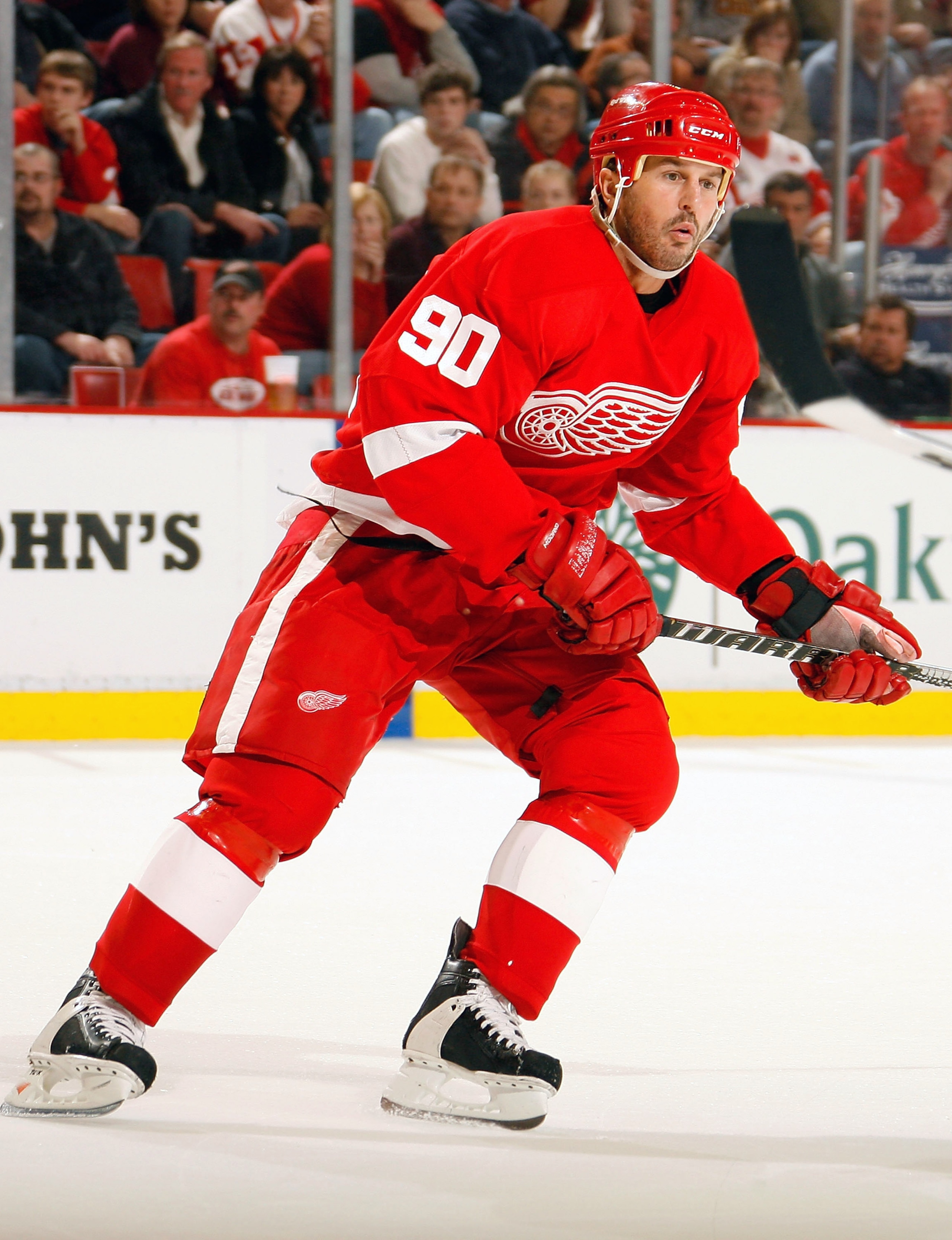 DETROIT, MI - NOVEMBER 21:  Mike Modano #90 of the Detroit Red Wings skates against the Calgary Flames during their NHL game at Joe Louis Arena on November 21, 2010 in Detroit, Michigan.(Photo by Dave Sandford/Getty Images)