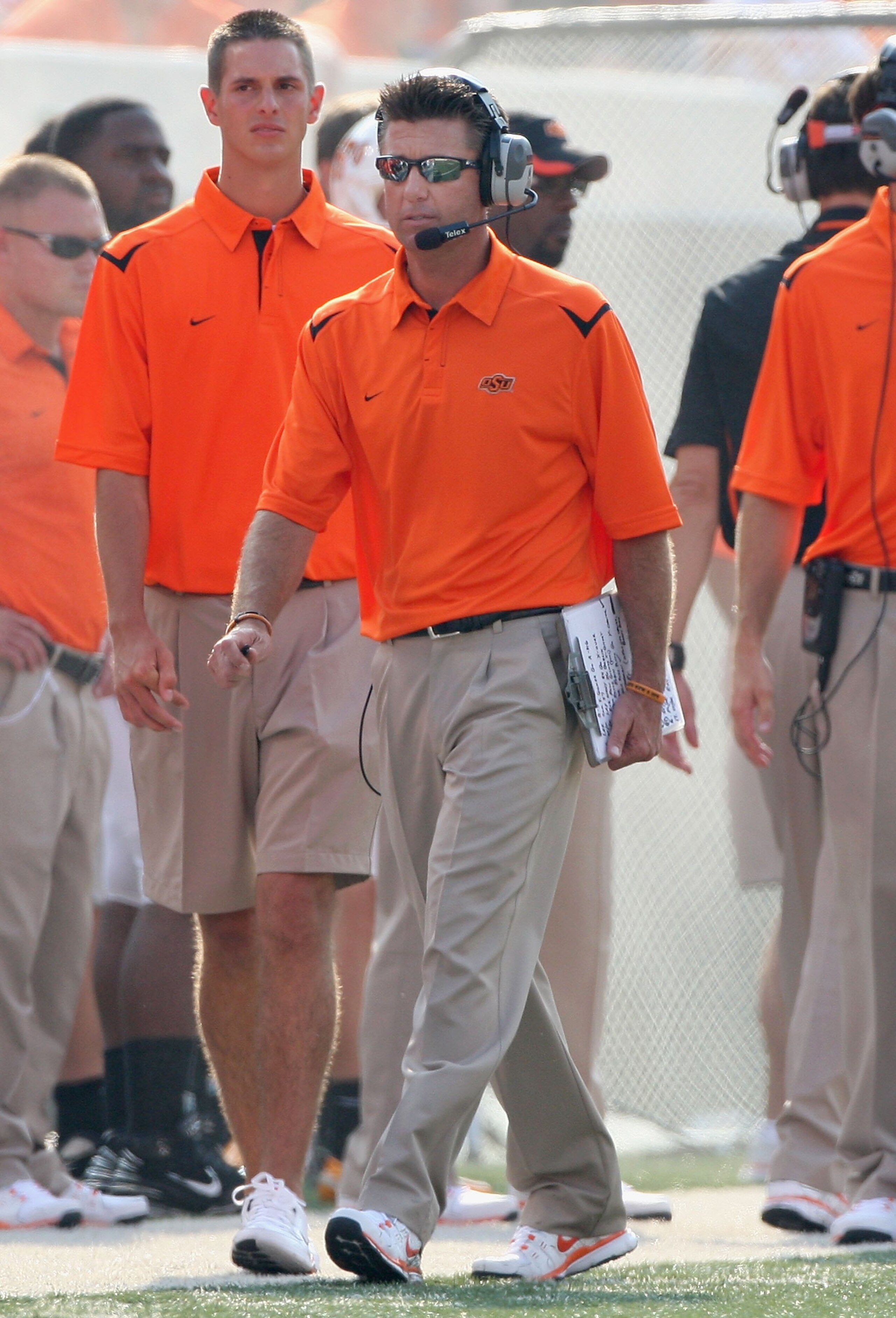 STILLWATER, OK - SEPTEMBER 05: Head coach Mike Gundy of the Oklahoma State Cowboys walks the sidelines during the college football game against the Georgia Bulldogs at Boone Pickens Stadium on September 5, 2009 in Stillwater, Oklahoma. The Cowboys defea STILLWATER, OK - SEPTEMBER 05: Head coach Mike Gundy of the Oklahoma State Cowboys walks the sidelines during the college football game against the Georgia Bulldogs at Boone Pickens Stadium on September 5, 2009 in Stillwater, Oklahoma. The Cowboys defea