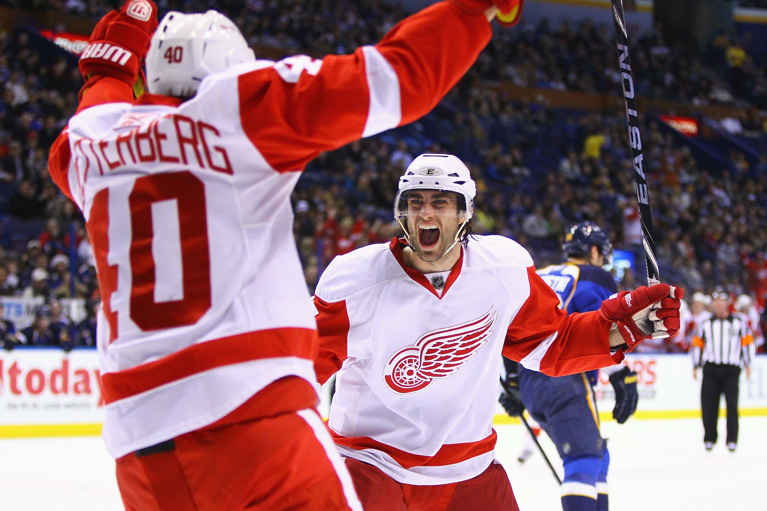 ST. LOUIS, MO - JANUARY 20: Patrick Eaves #17 of the Detroit Red Wings celebrates his goal with his teammate Henrik Zetterberg #40 against the St. Louis Blues at the Scottrade Center on January 20, 2011 in St. Louis, Missouri.  (Photo by Dilip Vishwanat/G