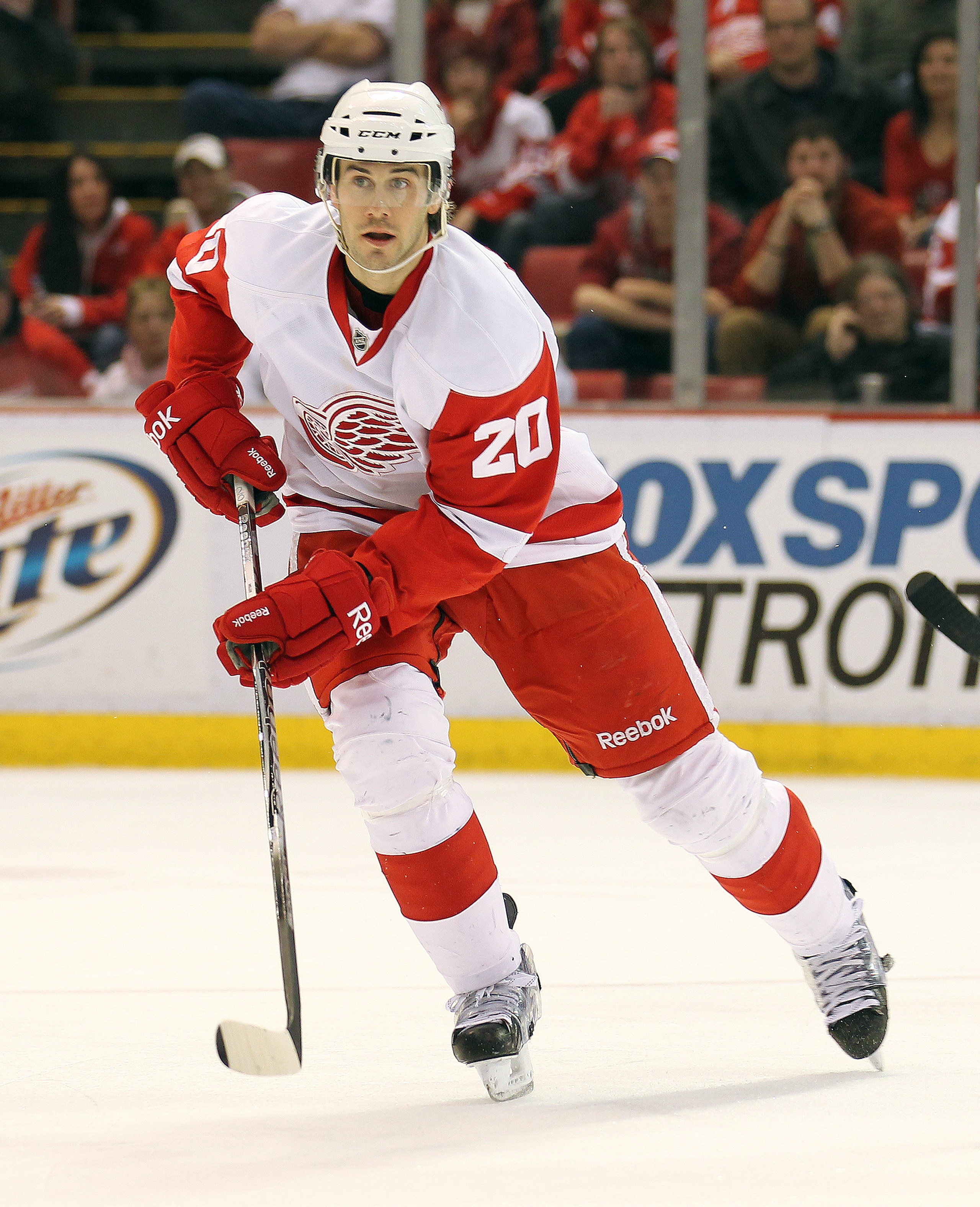 DETROIT, MI - JANUARY 22:  Drew Miller #20 of the Detroit Red Wings skates in a game against the Chicago Black Hawks on January 22, 2011 at the Joe Louis Arena in Detroit, Michigan. The Hawks defeated the Wings 4-1. (Photo by Claus Andersen/Getty Images)