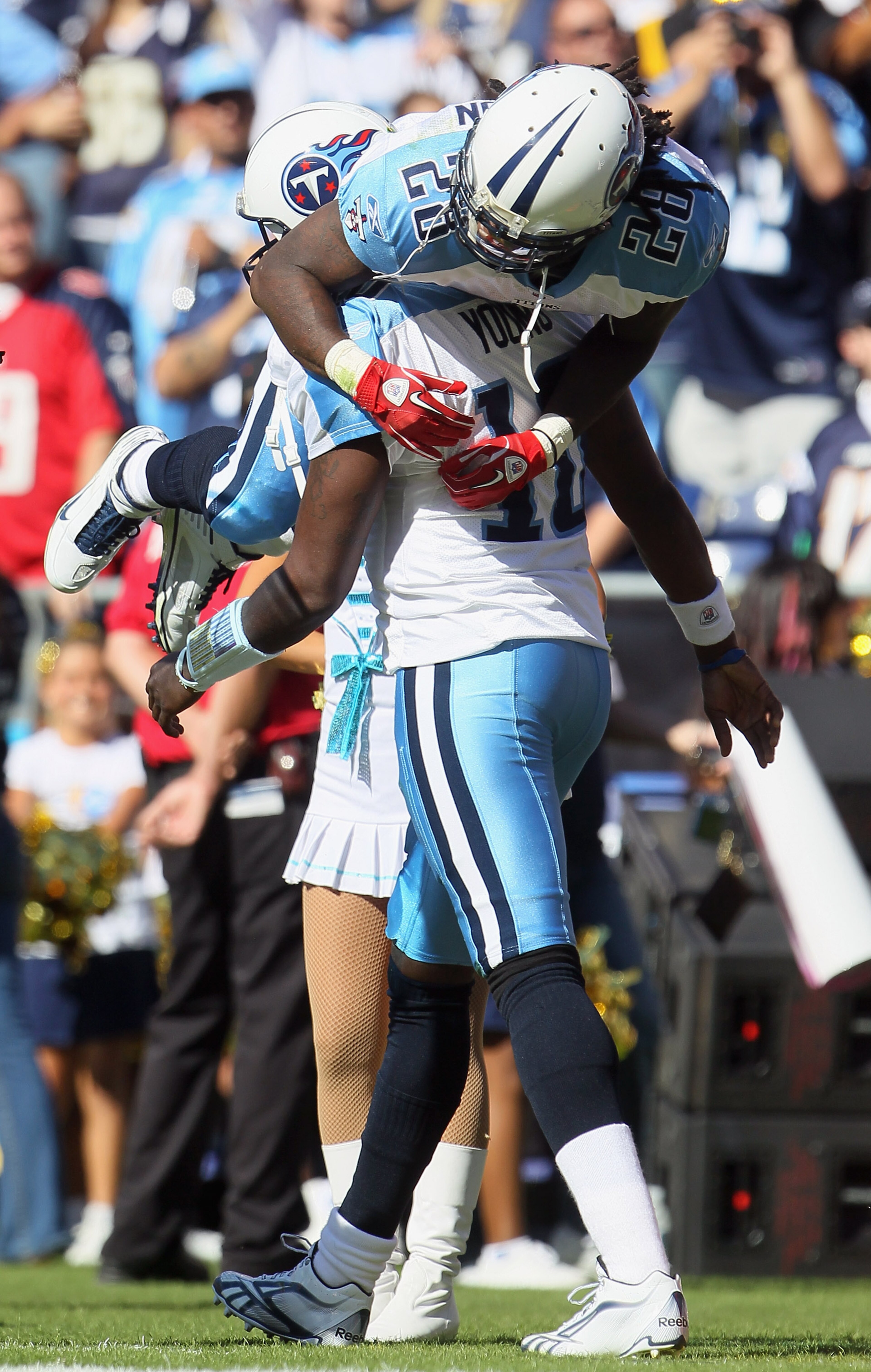SAN DIEGO - OCTOBER 31: Quarterback Vince Young #10 of the Tennessee Titans carries running back Chris Johnson #28 over his shoulders after Johnson scored a touchdown against the San Diego Chargers in the second quarter at Qualcomm Stadium on October 31, SAN DIEGO - OCTOBER 31: Quarterback Vince Young #10 of the Tennessee Titans carries running back Chris Johnson #28 over his shoulders after Johnson scored a touchdown against the San Diego Chargers in the second quarter at Qualcomm Stadium on October 31,