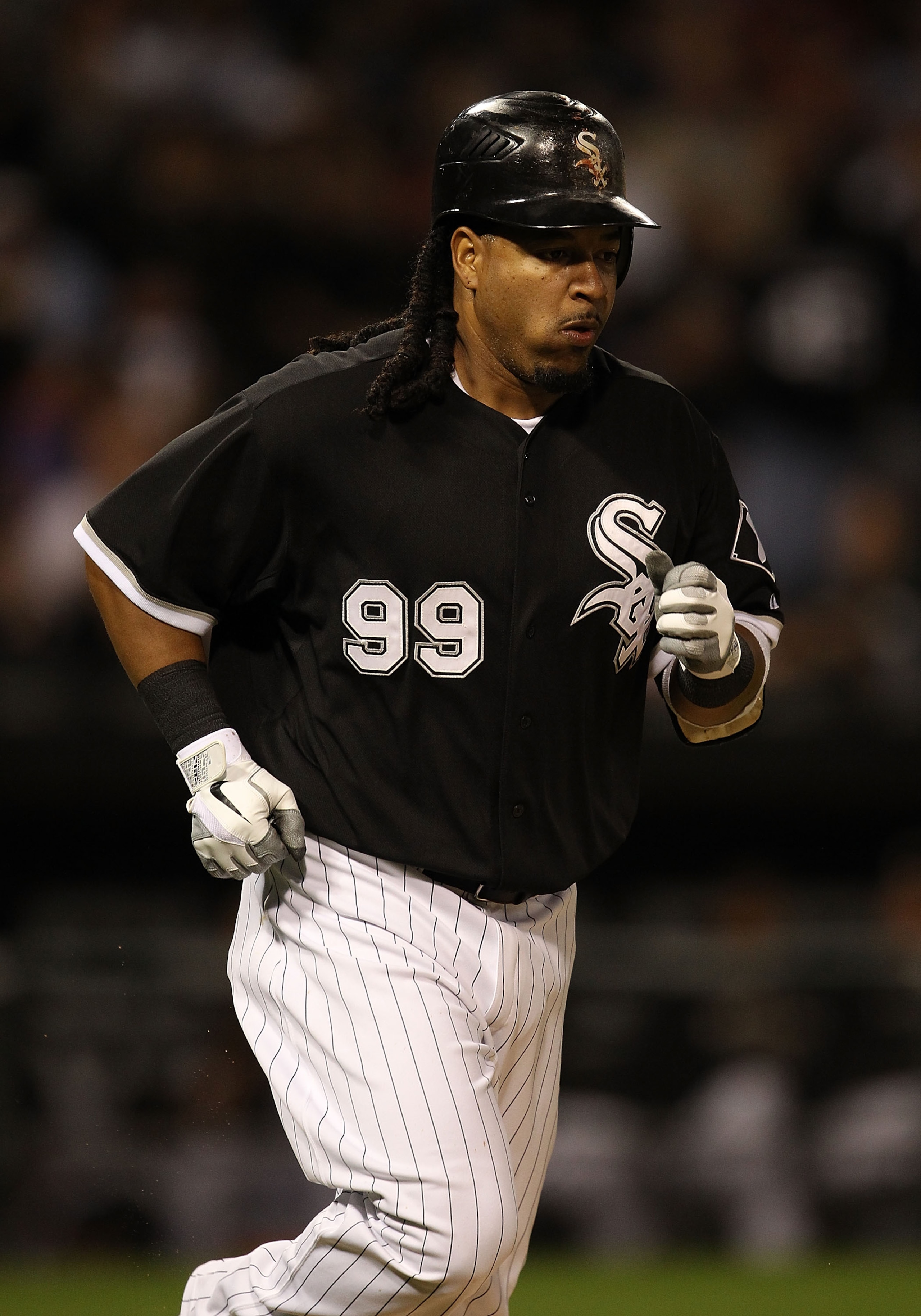 CHICAGO - SEPTEMBER 14: Manny Ramirez #99 of the Chicago White Sox draws a walk in the 6th inning against the Minnesota Twins at U.S. Cellular Field on September 14, 2010 in Chicago, Illinois. (Photo by Jonathan Daniel/Getty Images) CHICAGO - SEPTEMBER 14: Manny Ramirez #99 of the Chicago White Sox draws a walk in the 6th inning against the Minnesota Twins at U.S. Cellular Field on September 14, 2010 in Chicago, Illinois. (Photo by Jonathan Daniel/Getty Images)