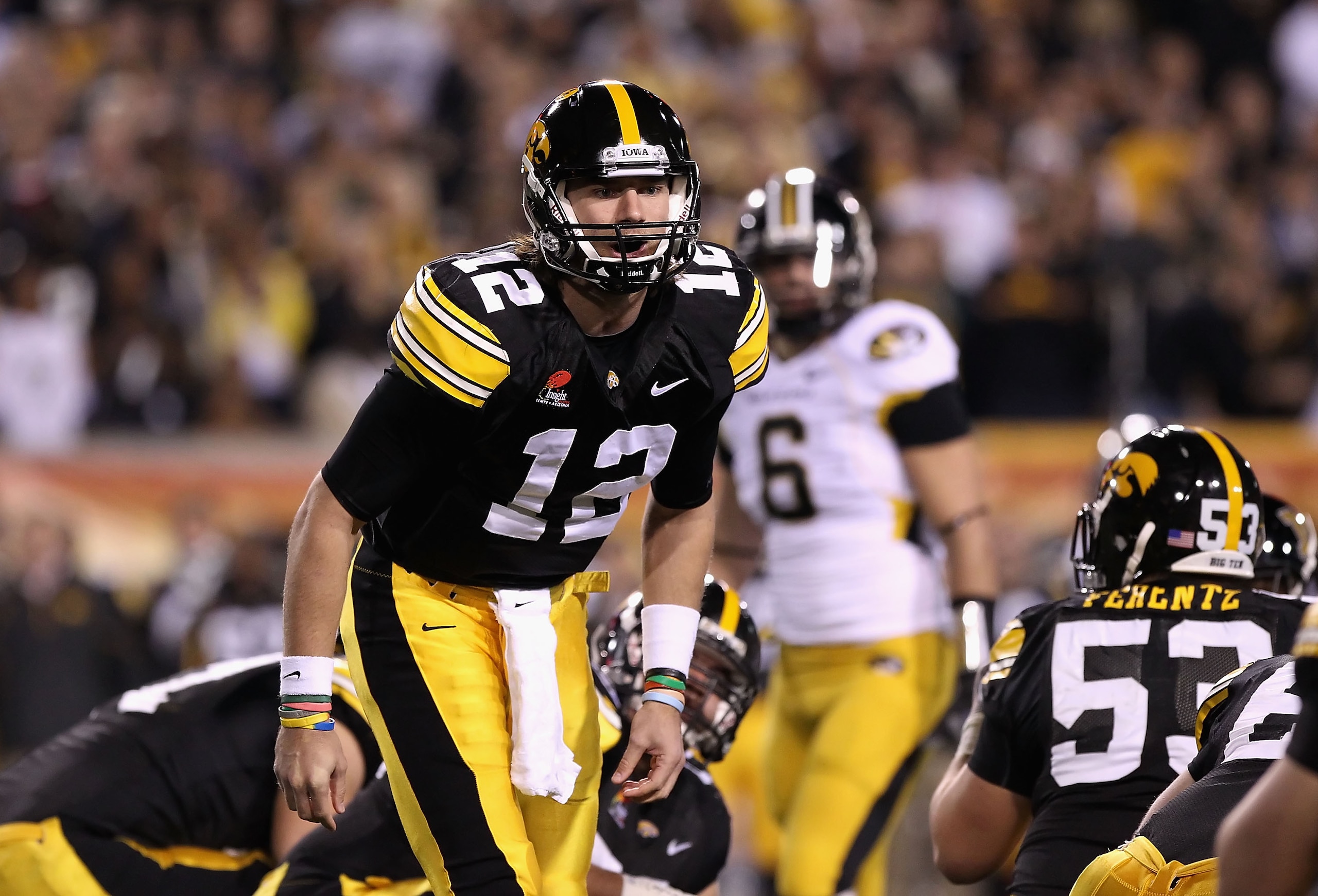 TEMPE, AZ - DECEMBER 28:  Quarterback Ricky Stanzi #12 of the Iowa Hawkeyes during the Insight Bowl against the Missouri Tigers at Sun Devil Stadium on December 28, 2010 in Tempe, Arizona. The Hawkeyes defeated the Tigers 27-24.  (Photo by Christian Peter