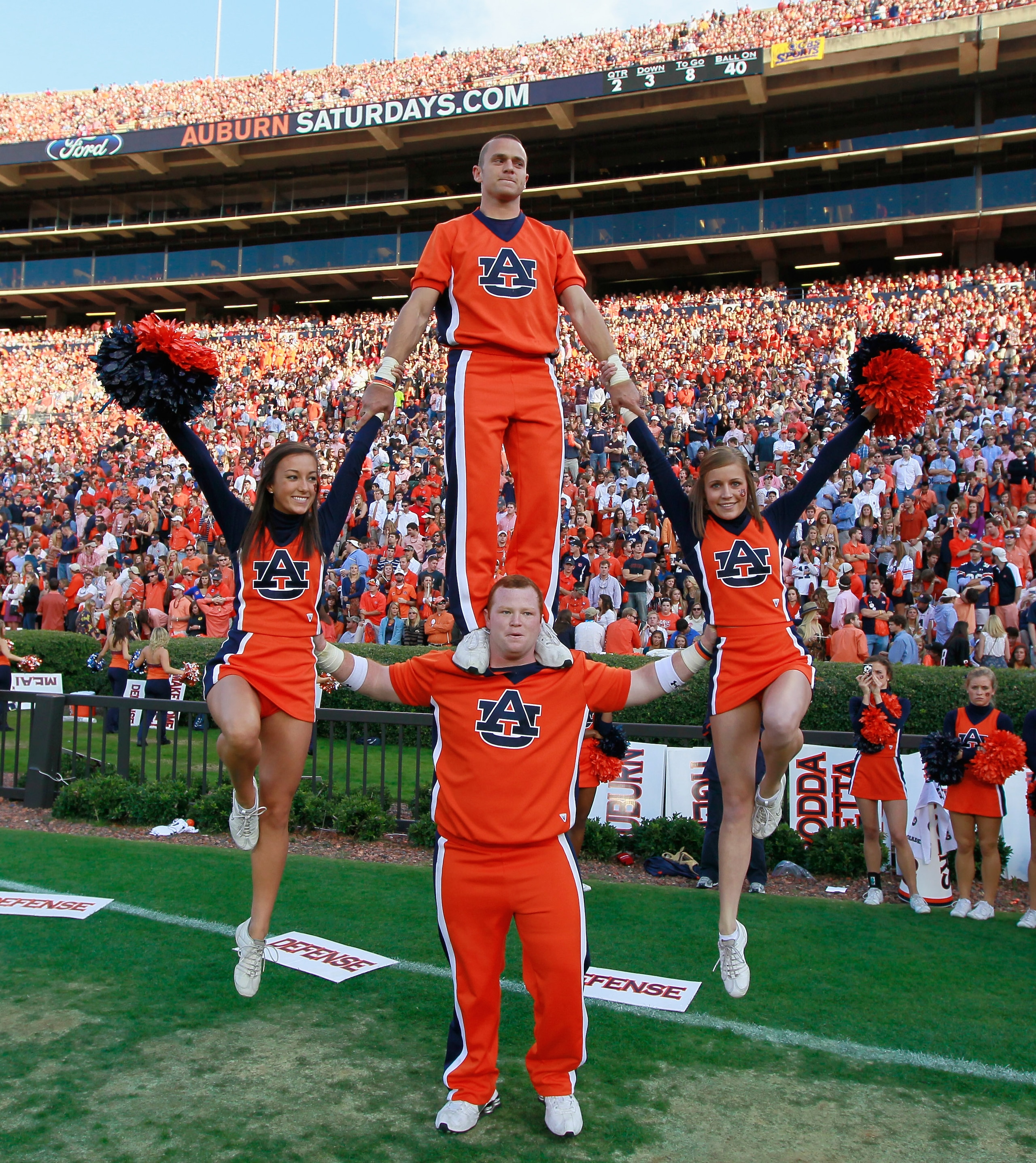 AUBURN, AL - NOVEMBER 13: Cheerleaders of the Auburn Tigers perform against the Georgia Bulldogs at Jordan-Hare Stadium on November 13, 2010 in Auburn, Alabama. (Photo by Kevin C. Cox/Getty Images) AUBURN, AL - NOVEMBER 13: Cheerleaders of the Auburn Tigers perform against the Georgia Bulldogs at Jordan-Hare Stadium on November 13, 2010 in Auburn, Alabama. (Photo by Kevin C. Cox/Getty Images)