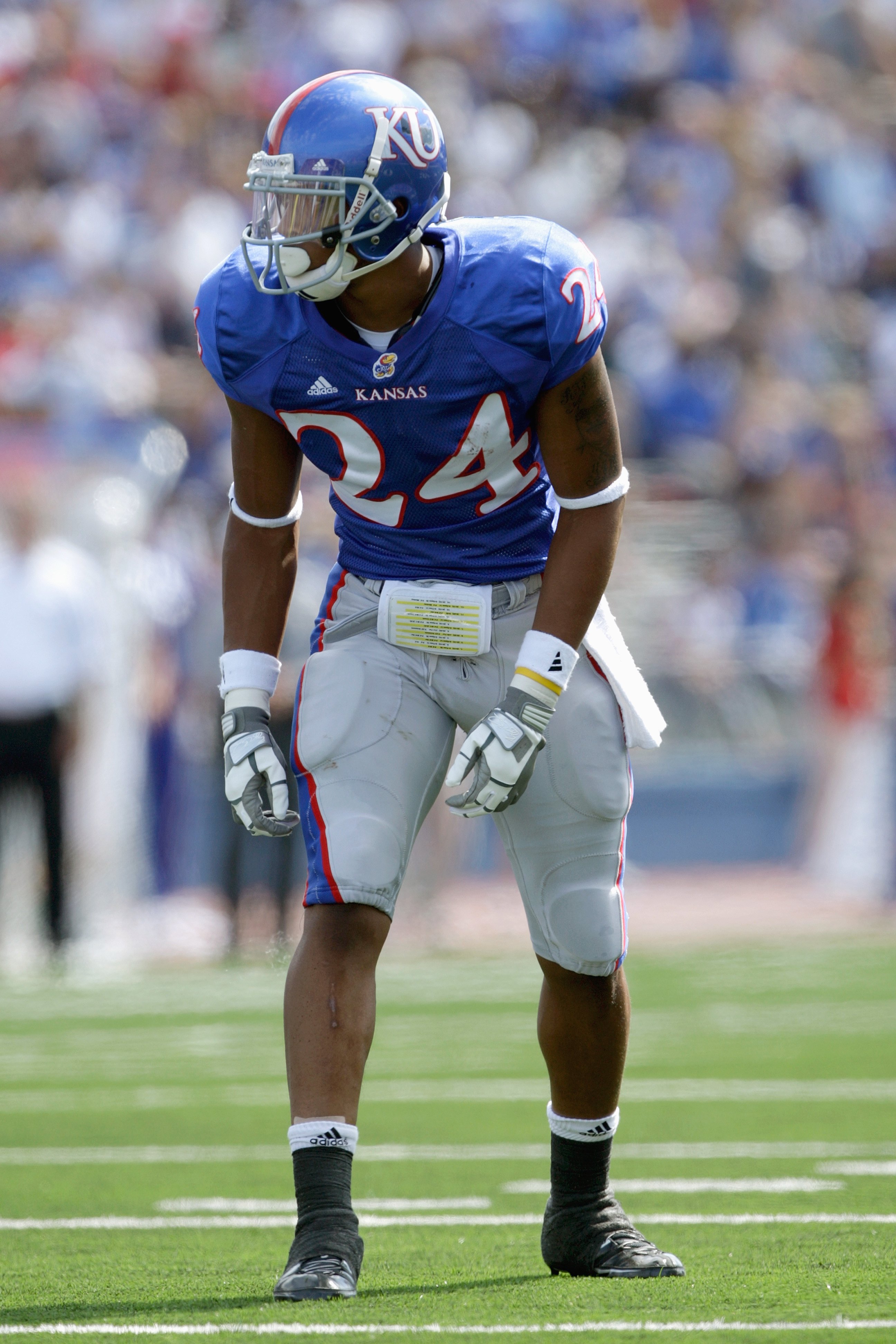 LAWRENCE, KS - SEPTEMBER 19: Wide reciever Bradley McDougald #24 of the Kansas Jayhawks gets ready on the line during the game against the Duke Blue Devils on Kivisto Field at Memorial Stadium on September 19, 2009 in Lawrence, Kansas. (Photo by Jamie Squ
