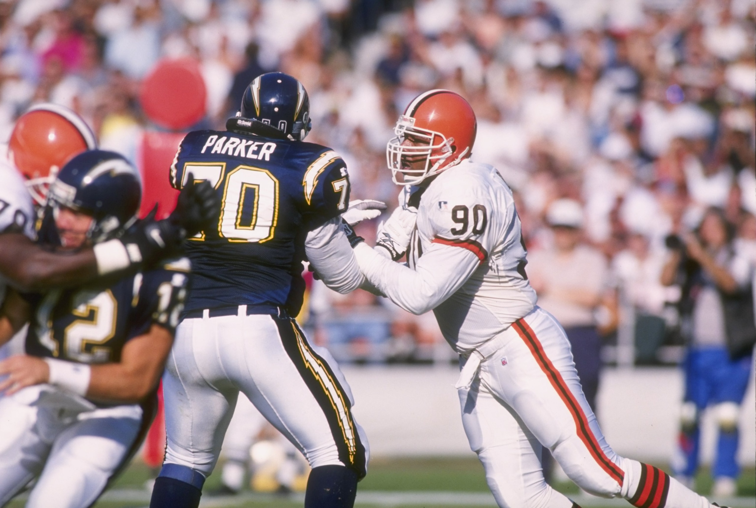 3 Dec 1995:  Defensive lineman Rob Burnett of the Cleveland Browns rushes the passer while being blocked by offensive lineman Vaughn Parker #70 of the San Diego Chargers during the Browns 31-13 loss to the Chargers at Jack Murphy Stadium in San Diego, Cal