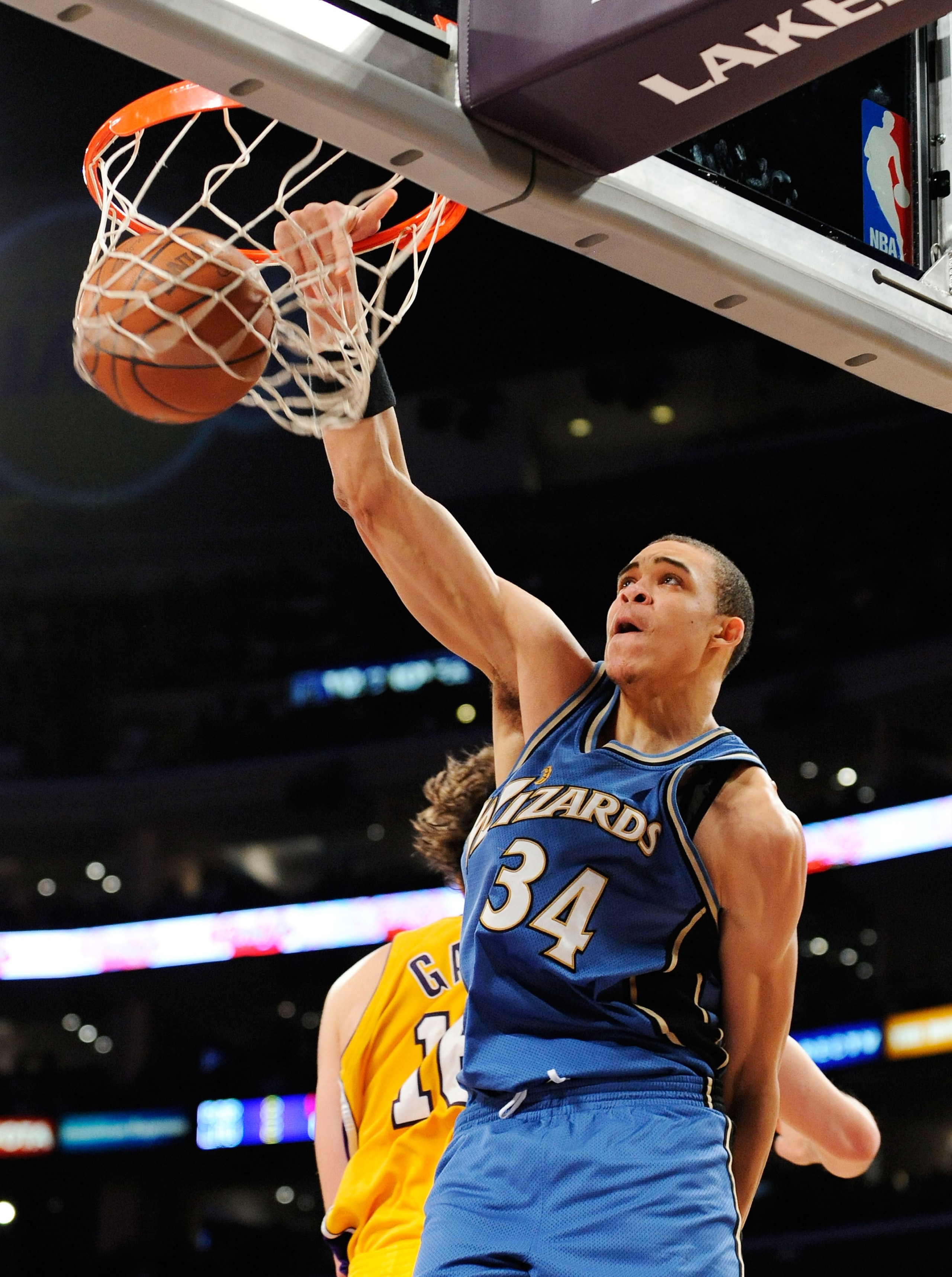 LOS ANGELES, CA - JANUARY 22: JaVale McGee #34 of the Washington Wizards slams the ball against Pau Gasol of the Los Angeles Lakers during the second quarter at the Staples Center January 22, 2009 in Los Angeles, California. NOTE TO USER: User expressly LOS ANGELES, CA - JANUARY 22: JaVale McGee #34 of the Washington Wizards slams the ball against Pau Gasol of the Los Angeles Lakers during the second quarter at the Staples Center January 22, 2009 in Los Angeles, California. NOTE TO USER: User expressly